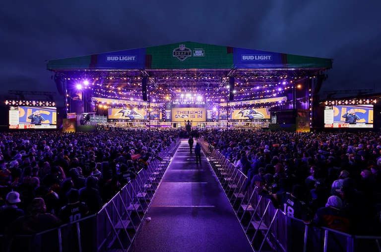 Fans watch during the second round of the NFL football draft, Friday, April 25, 2025, in Green Bay, Wis.