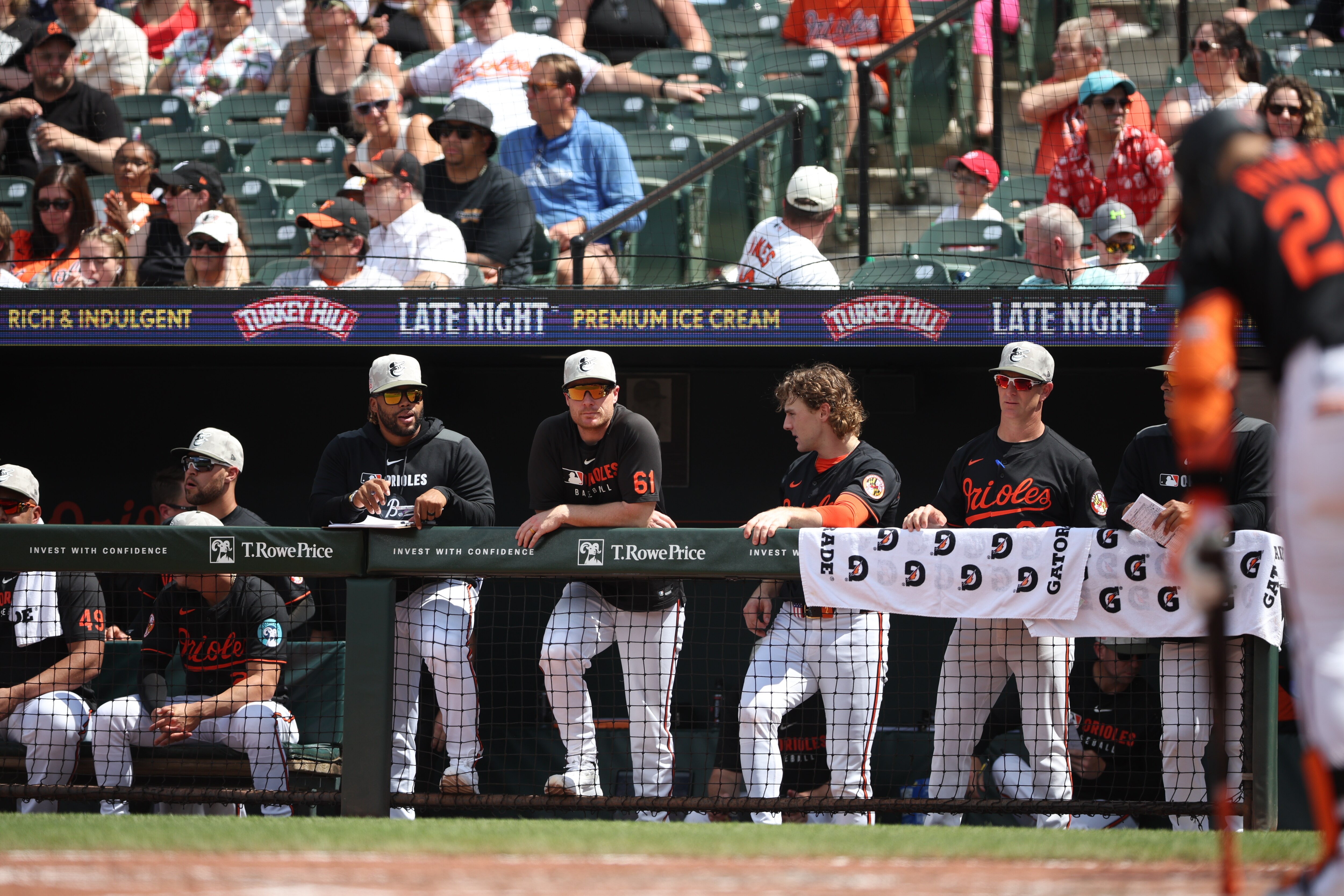 Players watch from the dugout as the Orioles’ losing streak reached six Sunday at Camden Yards.