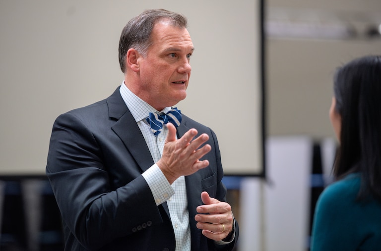 Harford County Schools Superintendent Dr. Sean Bulson speaks with community members at Aberdeen High School following a presentation on the school system's budget shortfall on November 20, 2024, in Aberdeen, Md.