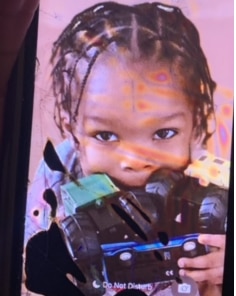 Police say someone can be seen on a video camera carrying Kaimir Rodgers from the home in the 1900 block of Ruxton Avenue on Tuesday, March 5, 2024.