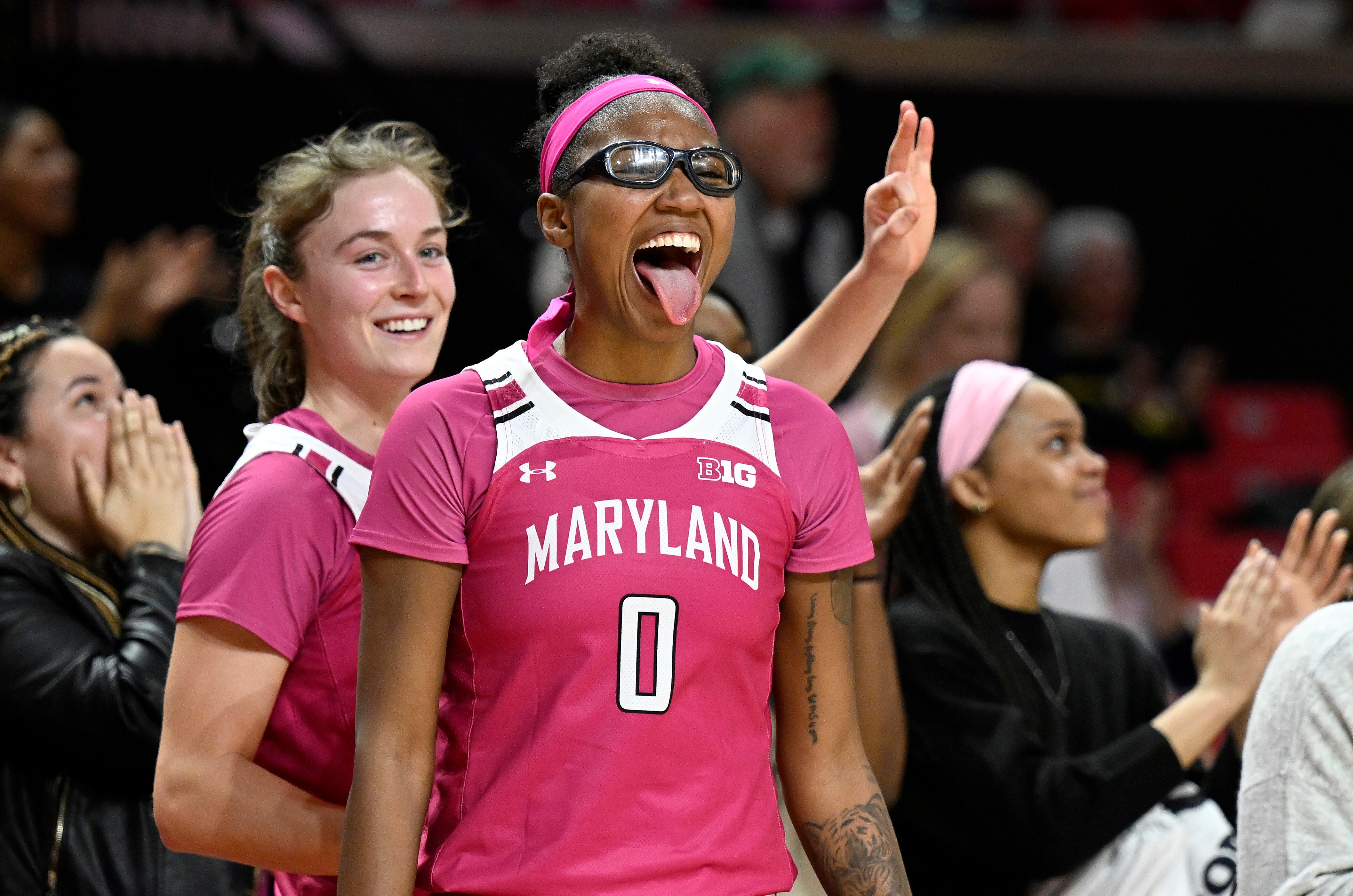 COLLEGE PARK, MARYLAND - FEBRUARY 05: Abby Meyers #10 and Shyanne Sellers #0 of the Maryland Terrapins celebrate in the fourth quarter against the Ohio State Buckeyes at Xfinity Center on February 05, 2023 in College Park, Maryland. (Photo by Greg Fiume/Getty Images)