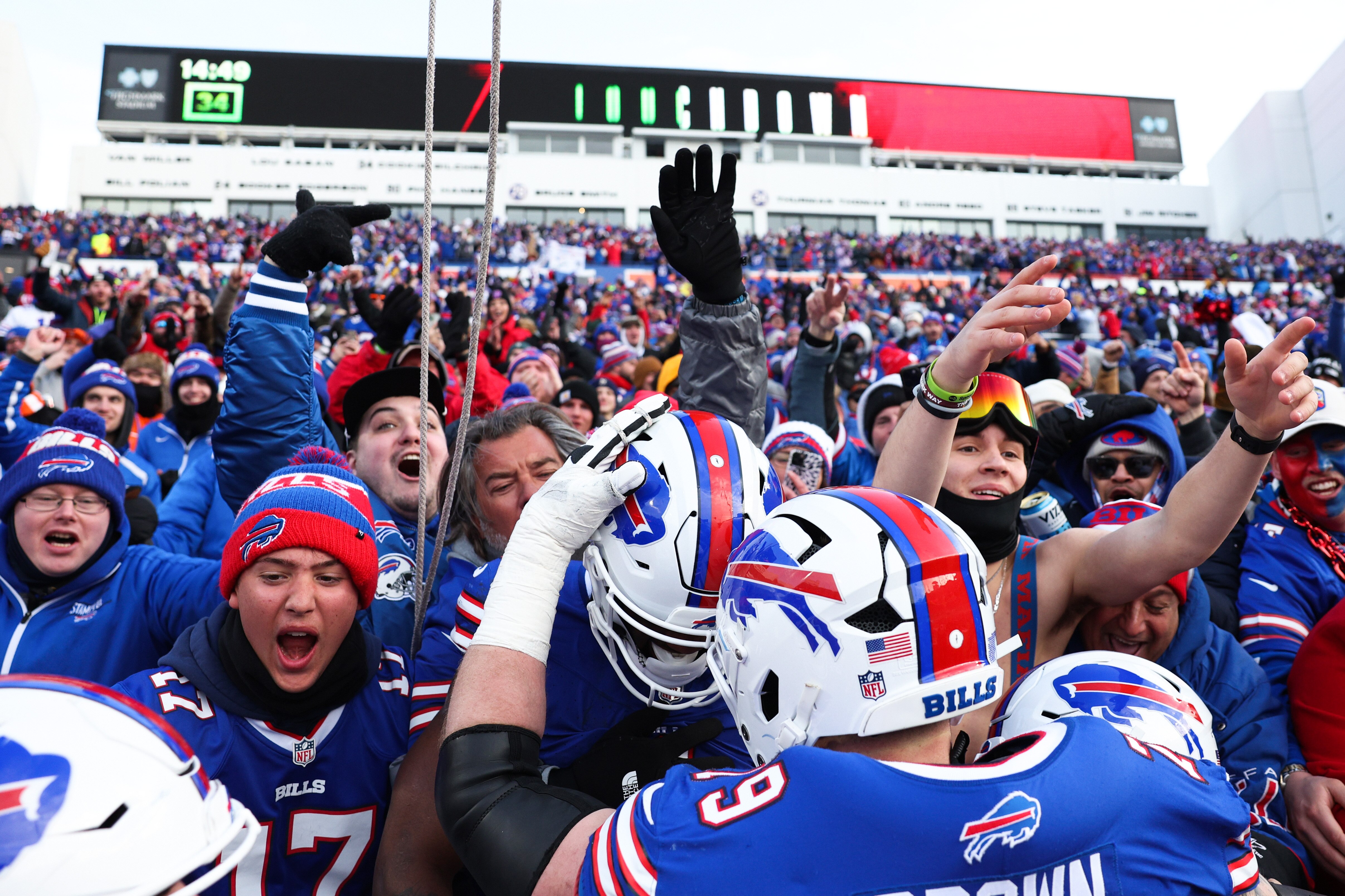 Curtis Samuel, center, of the Buffalo Bills celebrates after scoring a touchdown during the fourth quarter of a 31-7 win over Denver on Sunday.