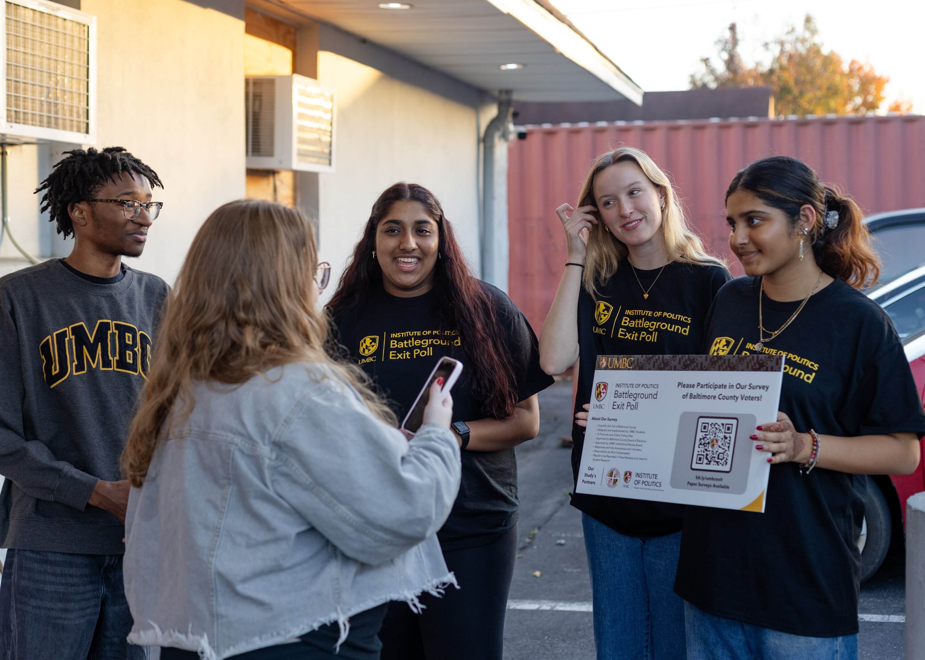 University of Maryland, Baltimore County students conduct exit polls for their Voting and Political Behavior class Outside of the English Consul Volunteer Fire Station in Lansdowne, MD on Nov. 5, 2024.
