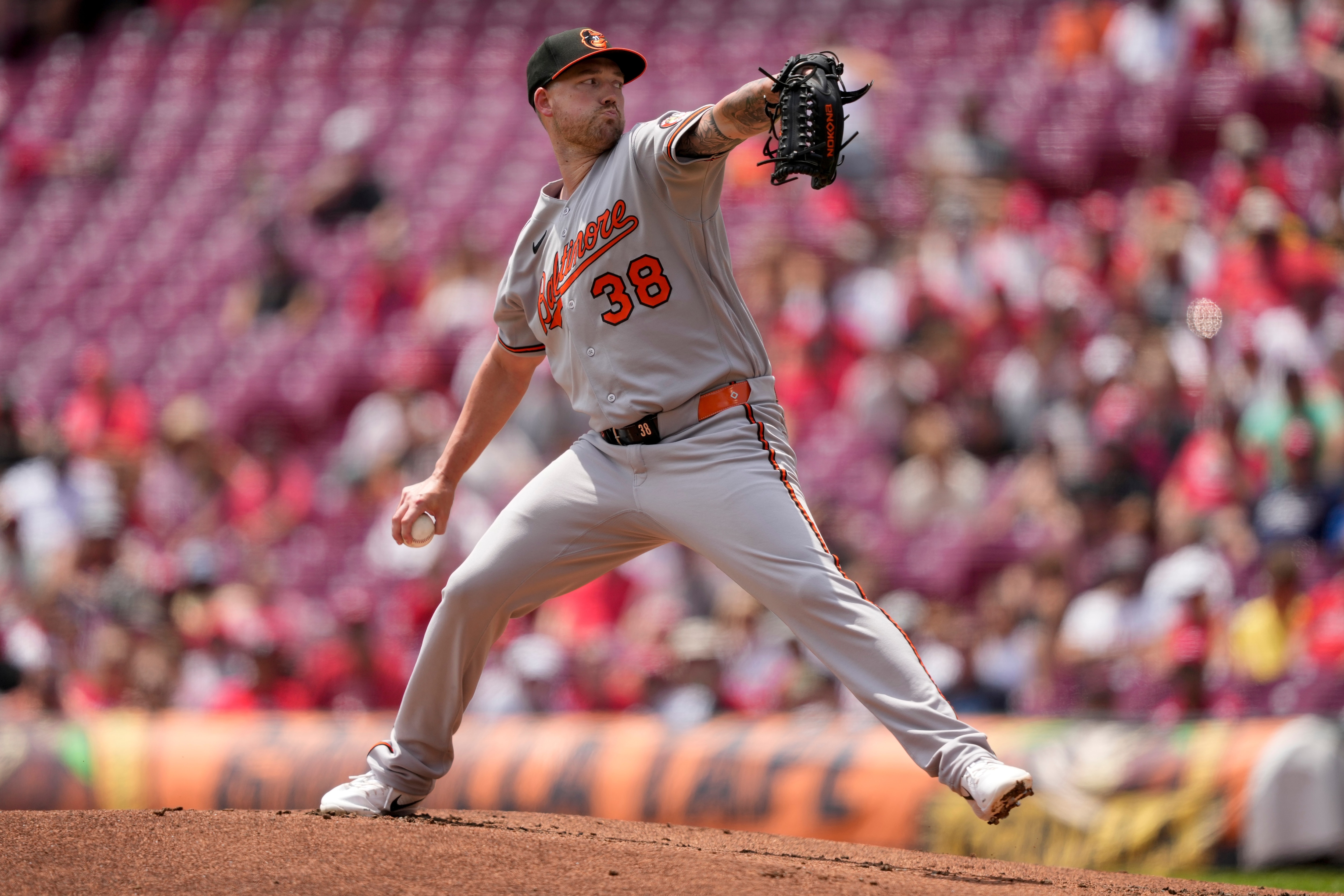 Baltimore Orioles pitcher Kyle Bradish throws during the first inning of a baseball game against Cincinnati Reds in Cincinnati, Sunday, July 5, 2026. (AP Photo/Carolyn Kaster)