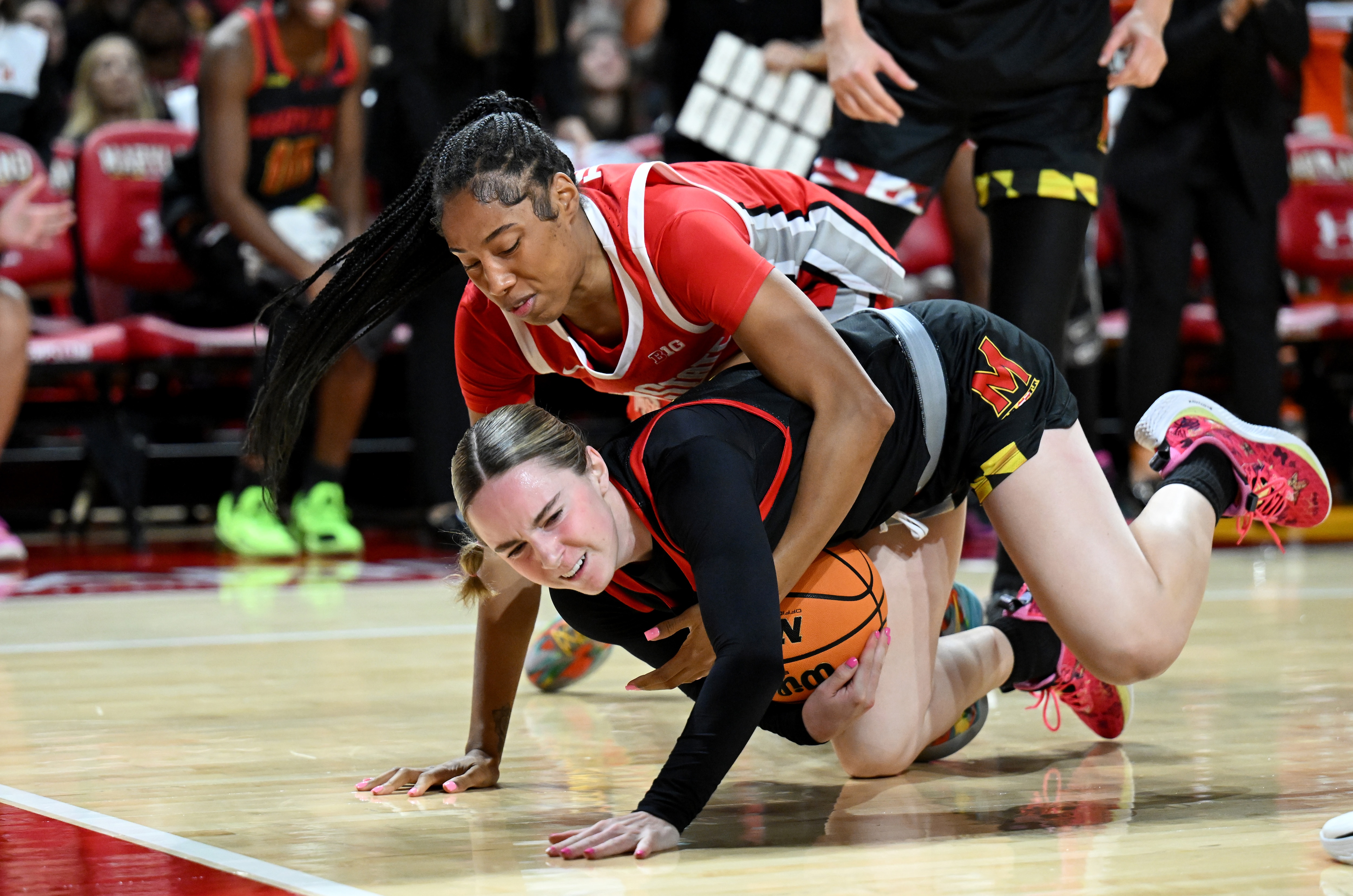 T’yana Todd of Ohio State, top, and Addi Mack of Maryland battle for possession during the Buckeyes’ win Saturday.