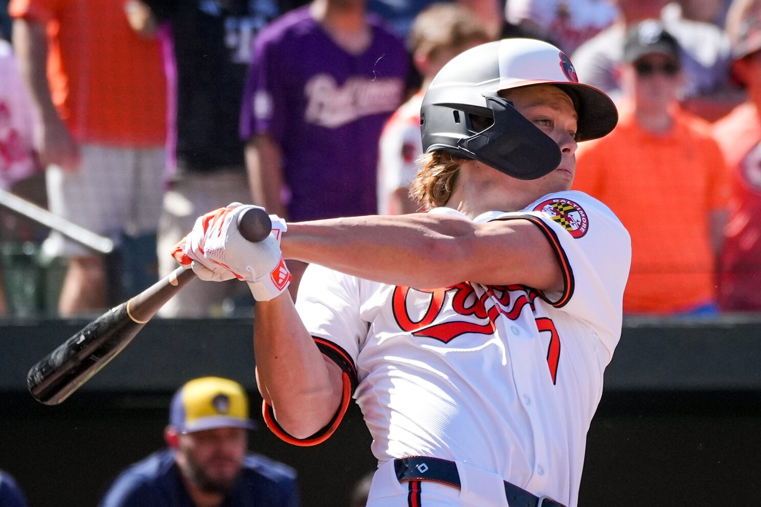 Second baseman Jackson Holliday records his first major league hit on Sunday against the Brewers.