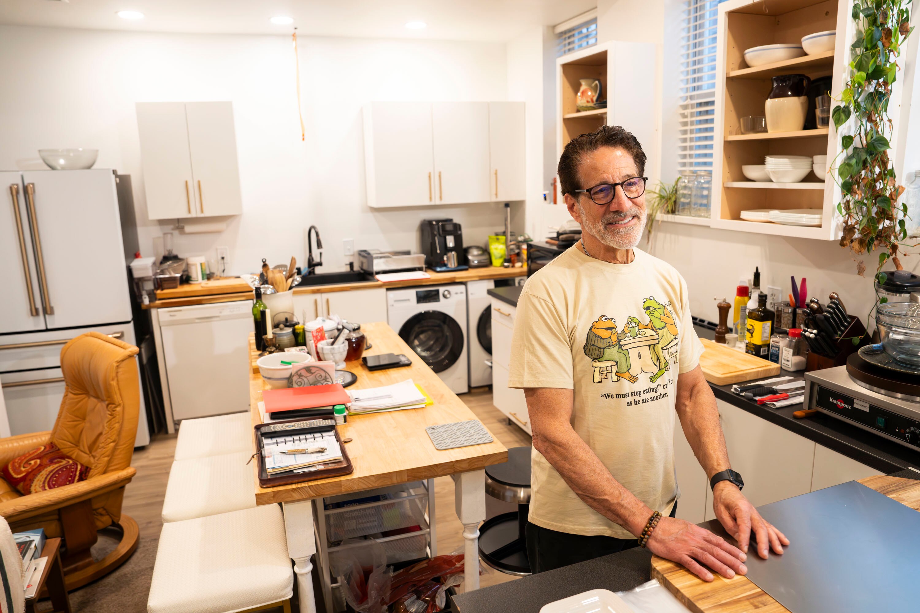 March 12, 2026 - David Korrie, owner of The Little Hungarian Bake Shoppe, stands in the apartment located in the back of the business. Korrie spoke with refugee agencies about sponsoring a Ukranian family and spent months taking notes on the eatery's operations and outfitting the apartment. As of right now, he is living in the apartment until a refugee family can be found to run the business.