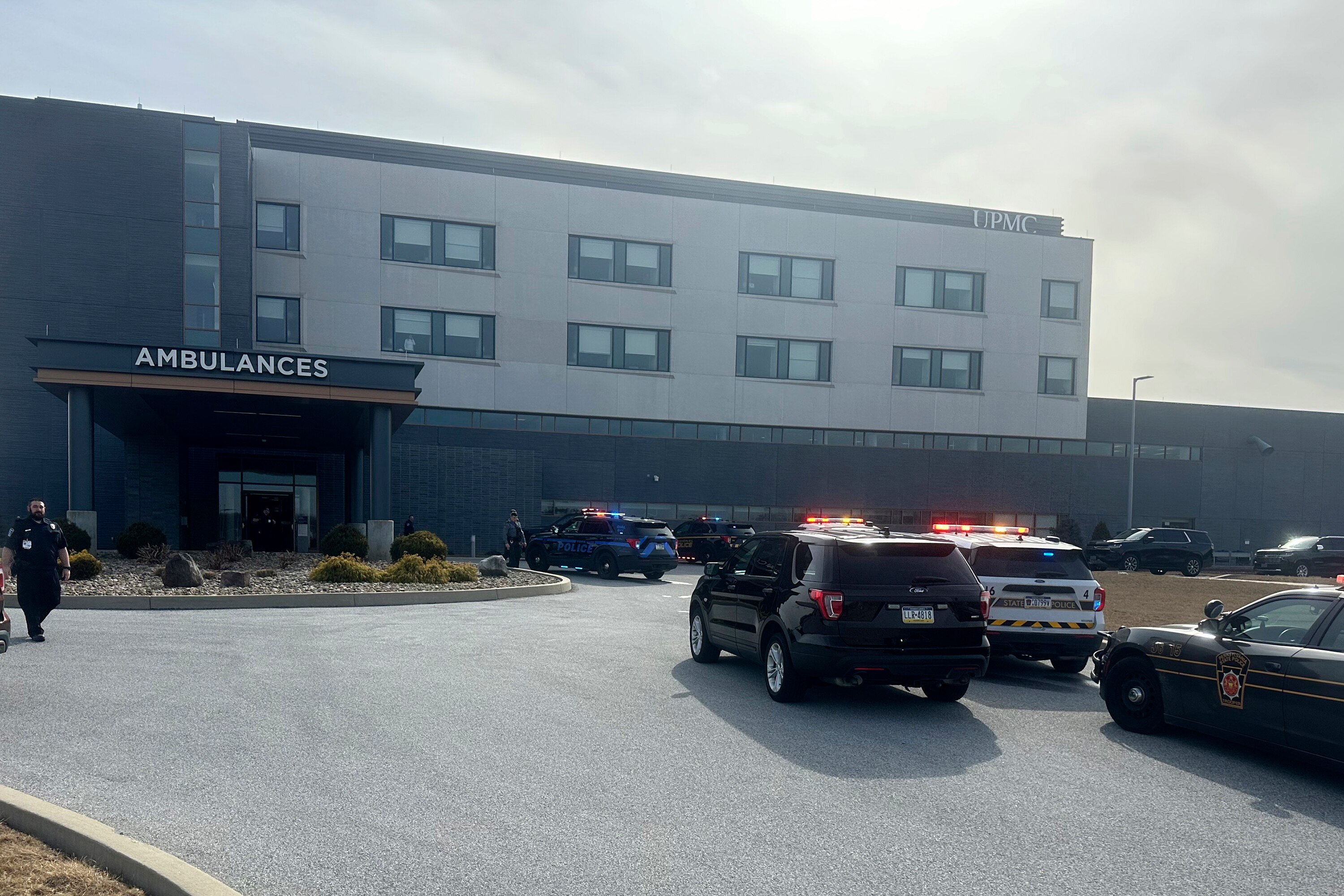 Law enforcement arrive at the scene of a shooting at UPMC Memorial Hospital in York, Pa. on Saturday, Feb. 22, 2025.  (AP Photo/Mark Scolforo)
