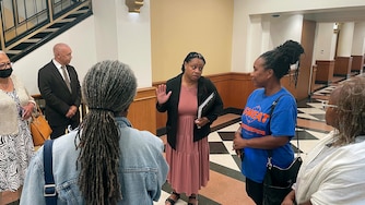 Tonya Sweat addresses supporters after a judge rejected her request to pause the certification of general election ballots.