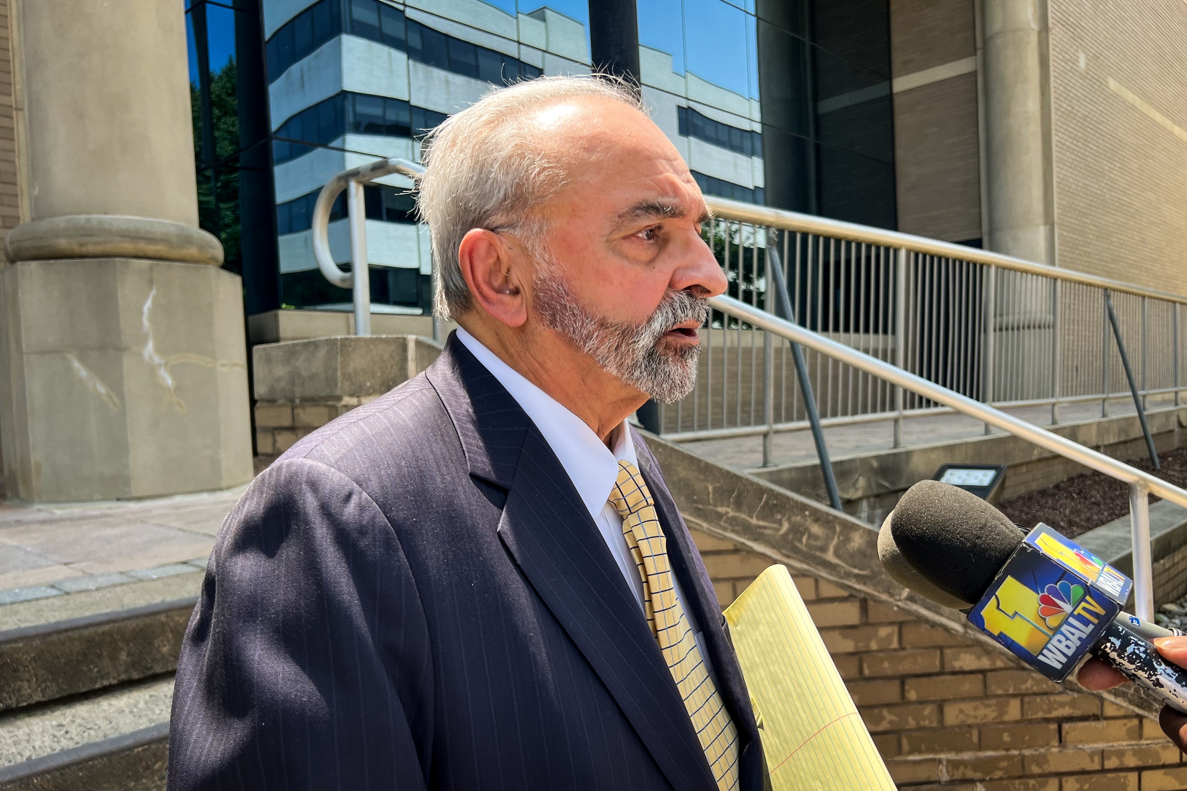 Domenic Iamele, Deel Creek Middle School physical education teacher Roger Myers’ attorney, talks to reporters on Monday outside the District Court of Maryland for Baltimore County in Towson after a bail review hearing on Monday, June 2, 2025.