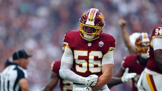 Washington Commanders linebacker Kain Medrano (56) celebrates after a fumble recovery during the first half of an NFL football game between the Commanders and the Indianapolis Colts in London on Sunday, Oct. 4, 2026. (AP Photo/Adam Bettcher)