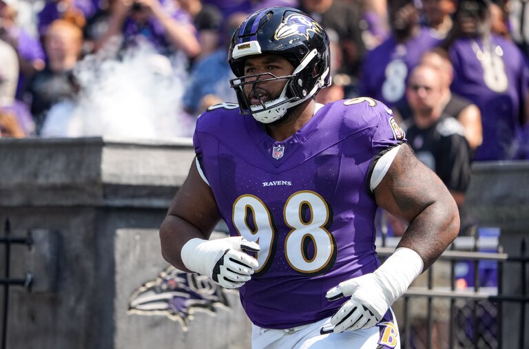 Baltimore Ravens defensive tackle Travis Jones (98) runs onto the field before his team’s home opening game against the Las Vegas Raiders at M&T Bank Stadium in Baltimore on Sunday, September 15, 2024.