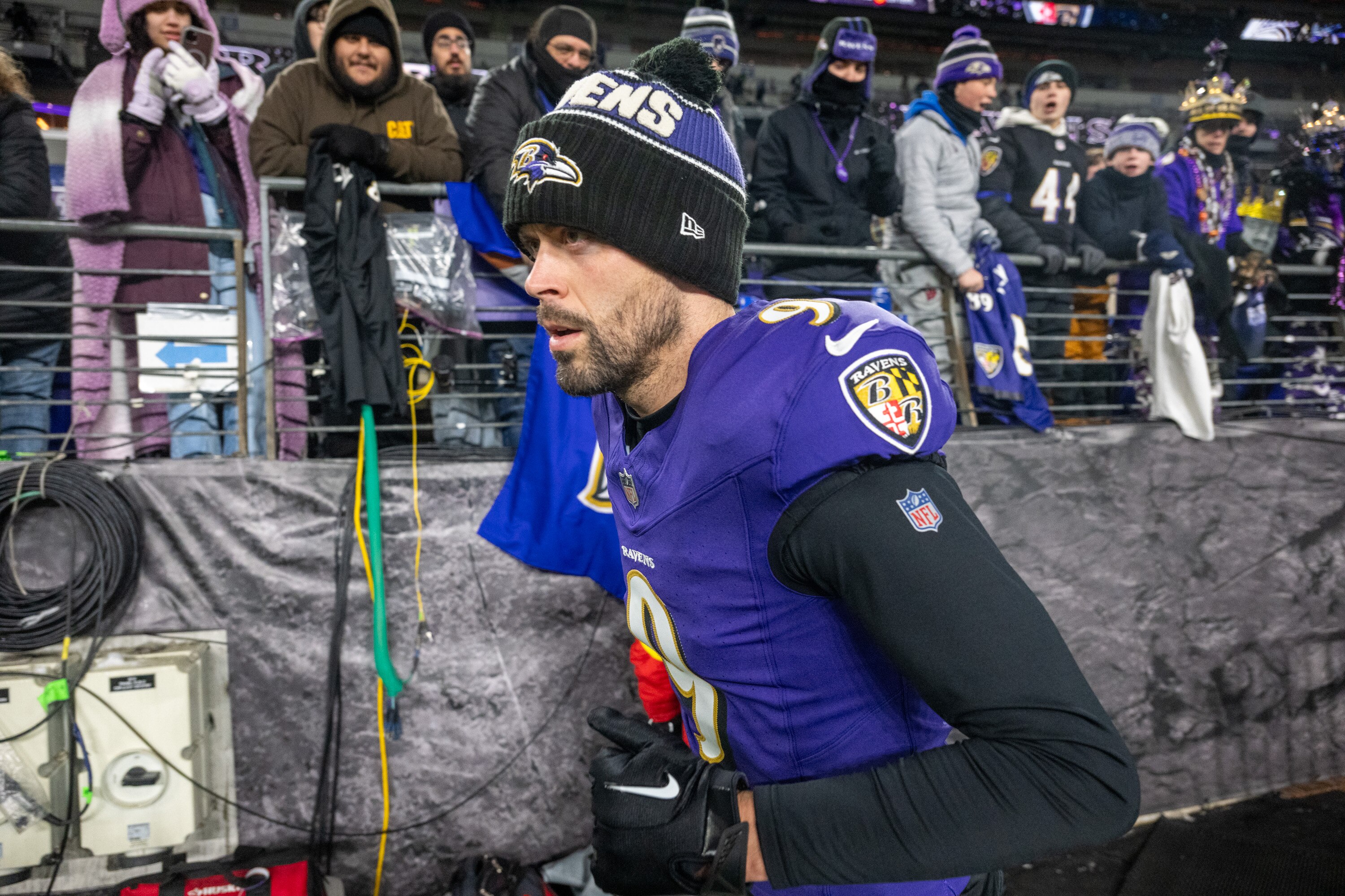 Kicker Justin Tucker takes the field for warmups before the Ravens’ playoff game against the Pittsburgh Steelers in January, Tucker’s last game in Baltimore.