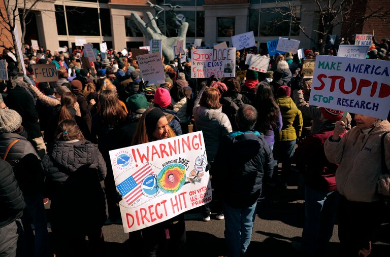 SILVER SPRING, MD - MARCH 03: Hundreds of demonstrators gather to protest against Department of Government Efficiency (DOGE) cuts outside the headquarters of the National Oceanic and Atmospheric Administration on March 03, 2025 in Silver Spring, Maryland. Last week the Trump administration fired about 800 probationary staff at NOAA, one of the world’s premier centers for climate science. The layoffs are on top of about 500 employees who left the agency after taking the so-called deferred resignation offer.