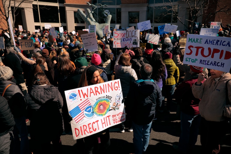 SILVER SPRING, MD - MARCH 03: Hundreds of demonstrators gather to protest against Department of Government Efficiency (DOGE) cuts outside the headquarters of the National Oceanic and Atmospheric Administration on March 03, 2025 in Silver Spring, Maryland. Last week the Trump administration fired about 800 probationary staff at NOAA, one of the world’s premier centers for climate science. The layoffs are on top of about 500 employees who left the agency after taking the so-called deferred resignation offer.