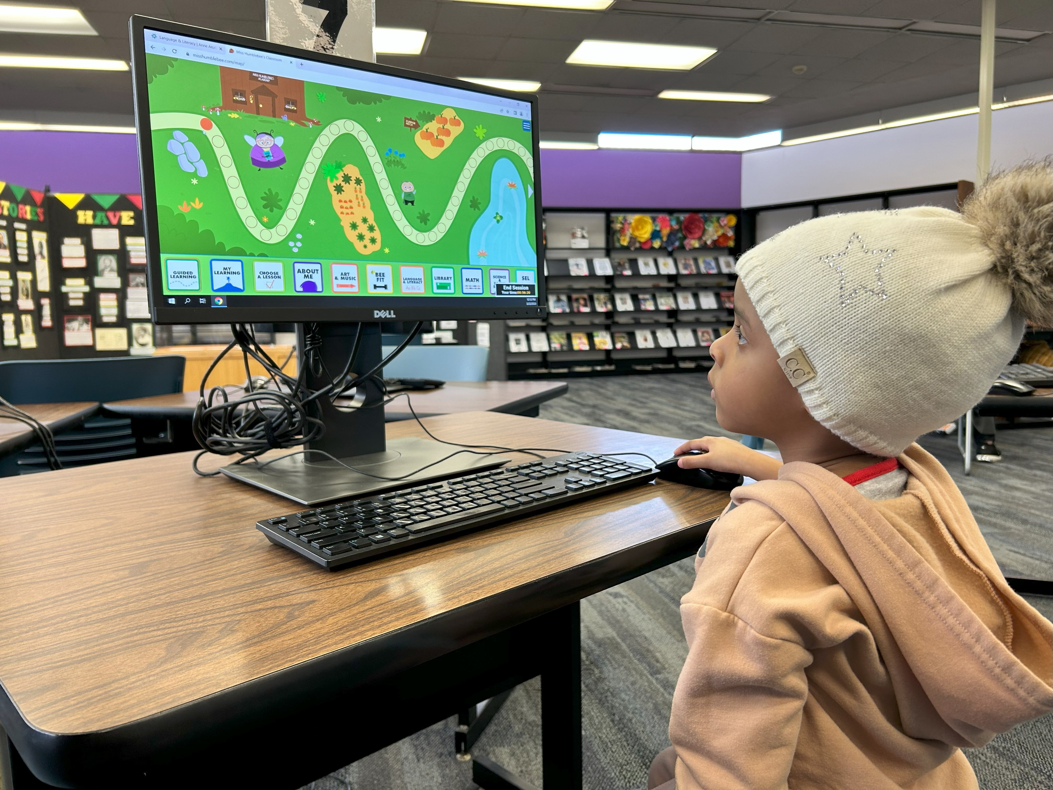 A young child uses the computer at the Glen Burnie Library.