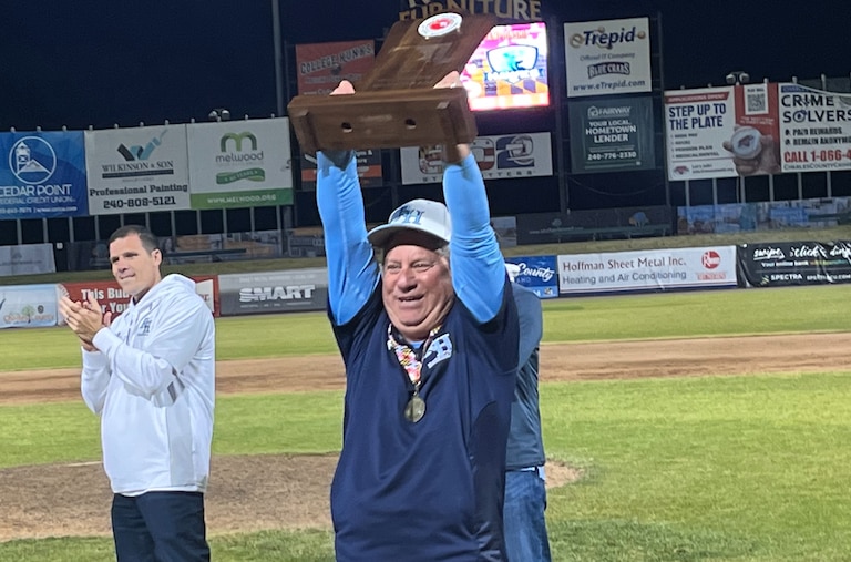 River Hill baseball coach Craig Estrin holds up the Class 3A state championship trophy Saturday evening. The No. 3 Hawks won their first title since 2009 with a 1-0 win over 15th-ranked C. Milton Wright at Regency Furniture Stadium in Southern Maryland.