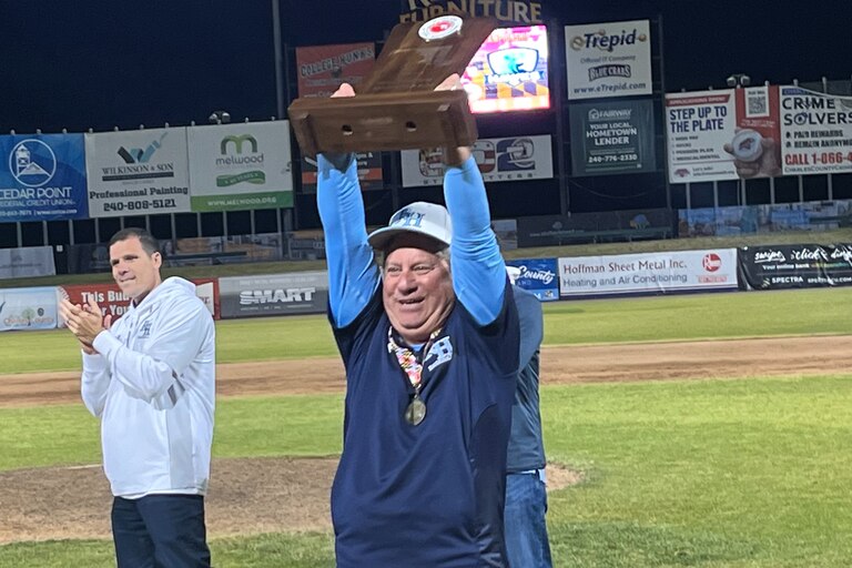 River Hill baseball coach Craig Estrin holds up the Class 3A state championship trophy Saturday evening. The No. 3 Hawks won their first title since 2009 with a 1-0 win over 15th-ranked C. Milton Wright at Regency Furniture Stadium in Southern Maryland.