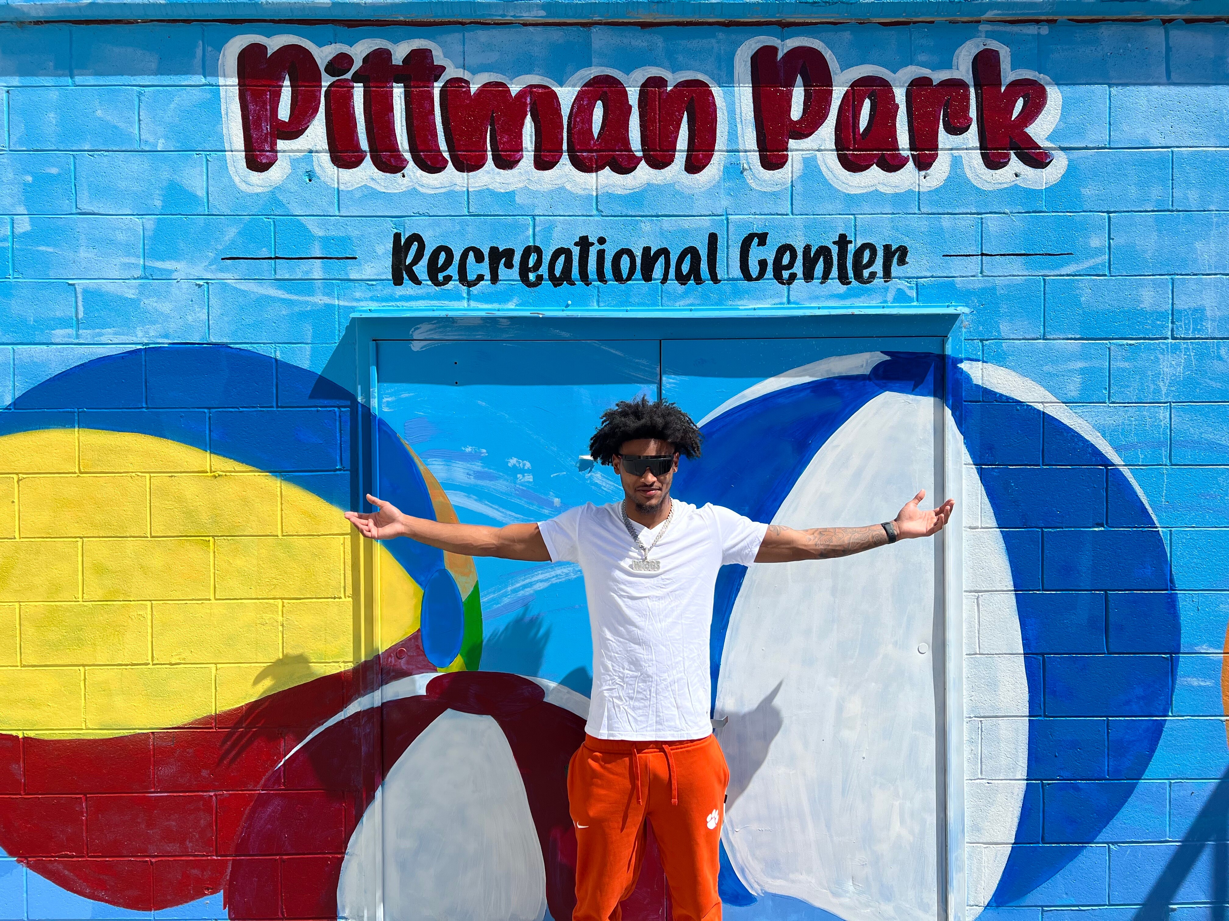 Once Nate Wiggins started finding success, and thus sponsors, on the football field, he used the funds to give back to the community he came from. (Courtesy of Tamika Lucas)