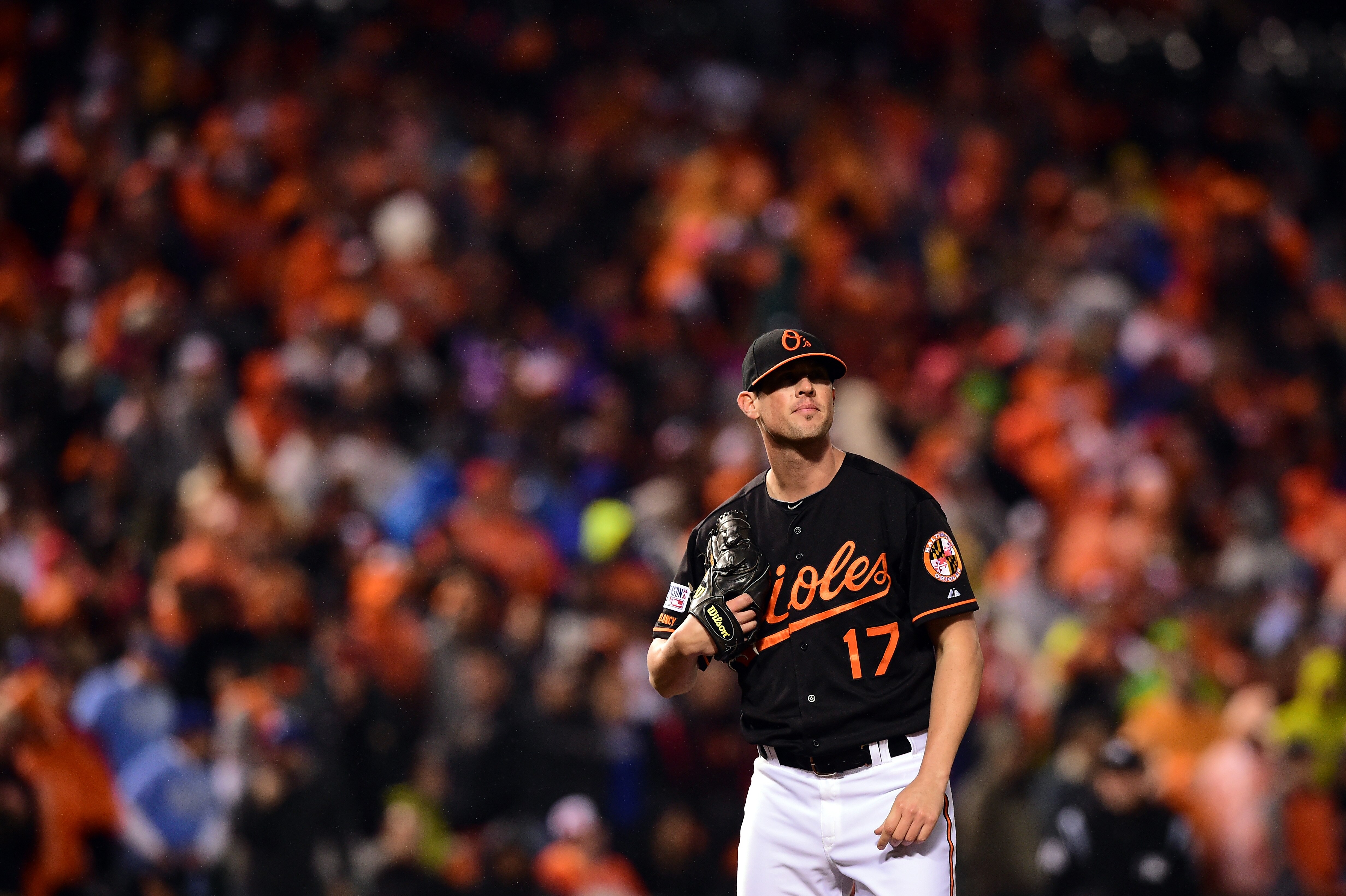 BALTIMORE, MD - OCTOBER 10:  Brian Matusz #17 of the Baltimore Orioles reacts after Mike Moustakas #8 of the Kansas City Royals hit a two run home run to right center field in the tenth inning during Game One of the American League Championship Series at Oriole Park at Camden Yards on October 10, 2014 in Baltimore, Maryland.