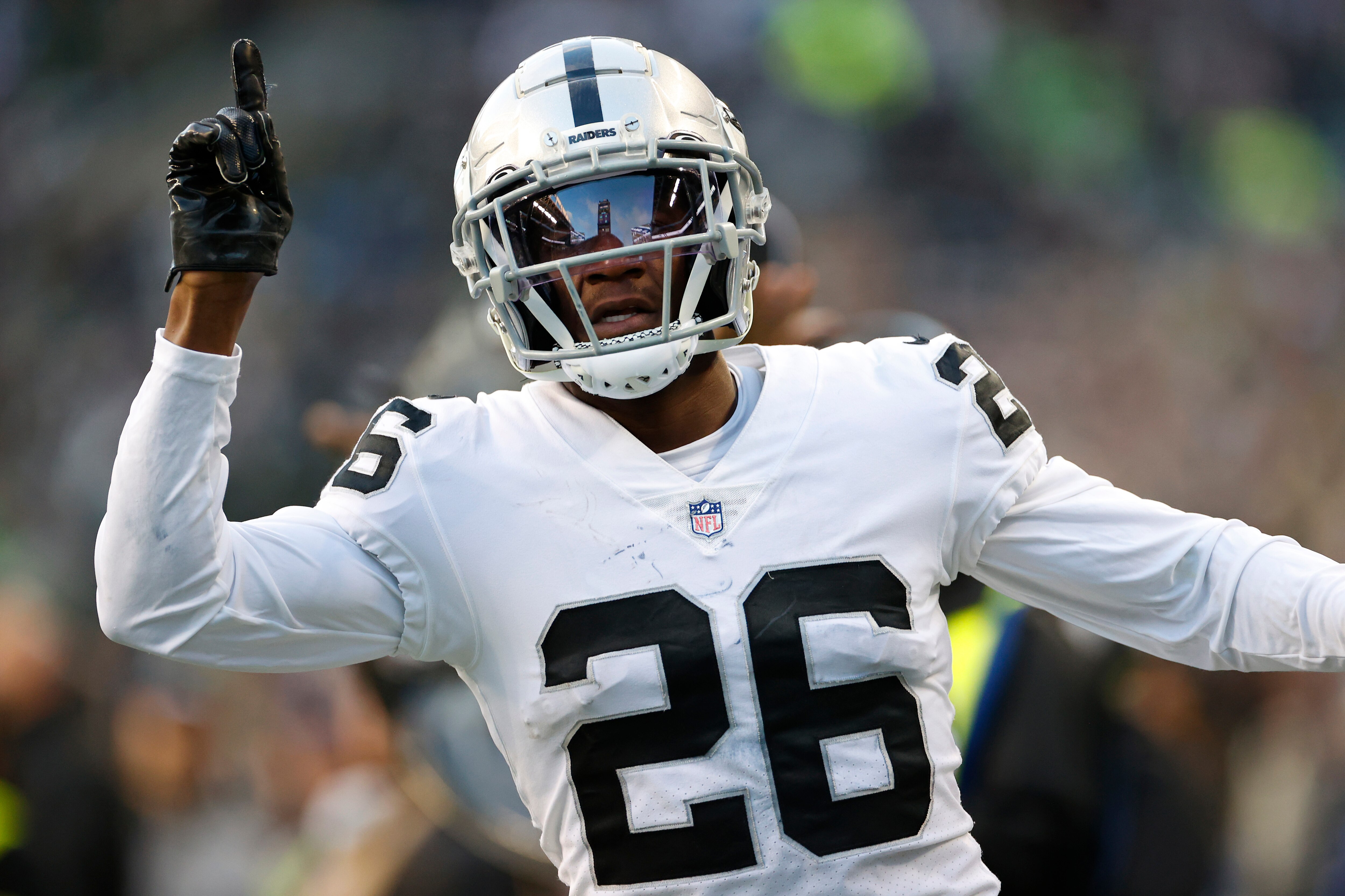 SEATTLE, WASHINGTON - NOVEMBER 27: Rock Ya-Sin #26 of the Las Vegas Raiders reacts in the fourth quarter against the Seattle Seahawks at Lumen Field on November 27, 2022 in Seattle, Washington.