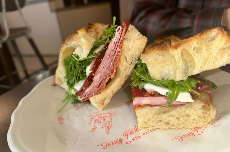 January 29, 2026 - AP Pizza Shop in Bethesda. The Italiano is loaded up with Genoa salami, finocchiona, sopressata, mortadella, mozzarella, spicy peppers and finished with oil and vinegar.