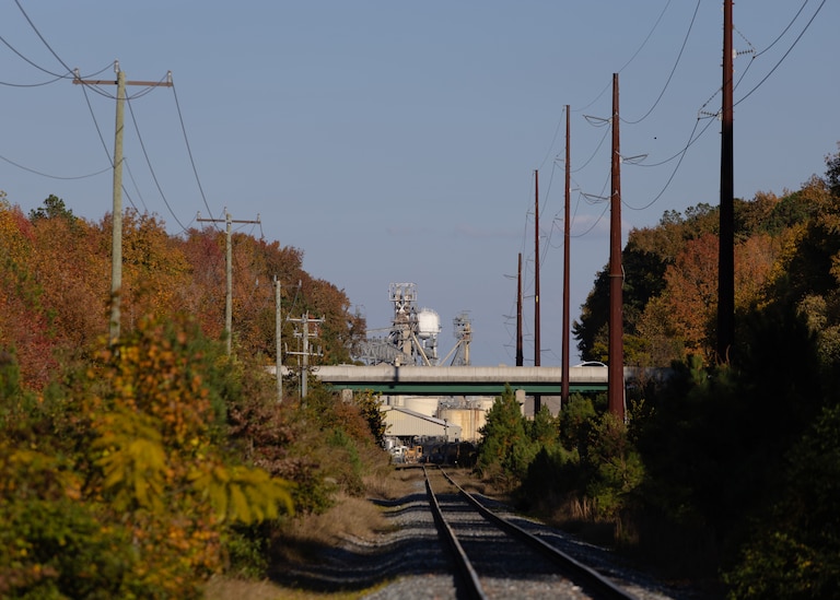 Railroad tracks that service Perdue Agriculture run parallel to Peggy Branch, a stream in Salisbury, MD, on Oct. 24, 2024. Perdue Agribusiness has been found to be disposing of wastewater containing elevated levels of PFAS, therefore contaminating the ground water and drinking water of some residents.