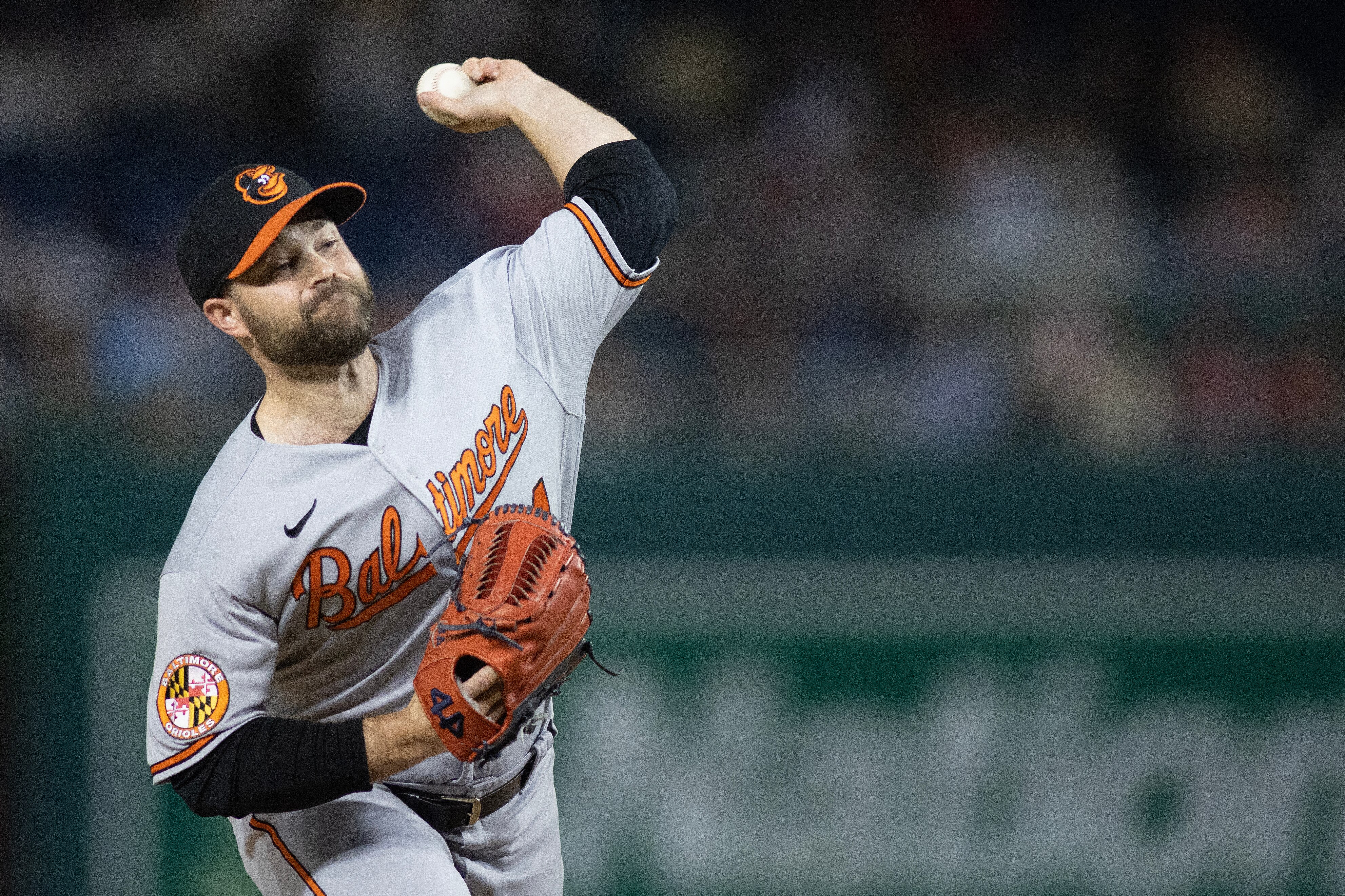 Baltimore Orioles relief pitcher Danny Coulombe (54) throws a pitch during a regular season game between the Baltimore Orioles and Washington Nationals at Nationals Park in Washington, D.C., on Tuesday, April 18, 2023. Baltimore defeated the Nationals 1-0. (Tom Brenner for The Baltimore Banner)