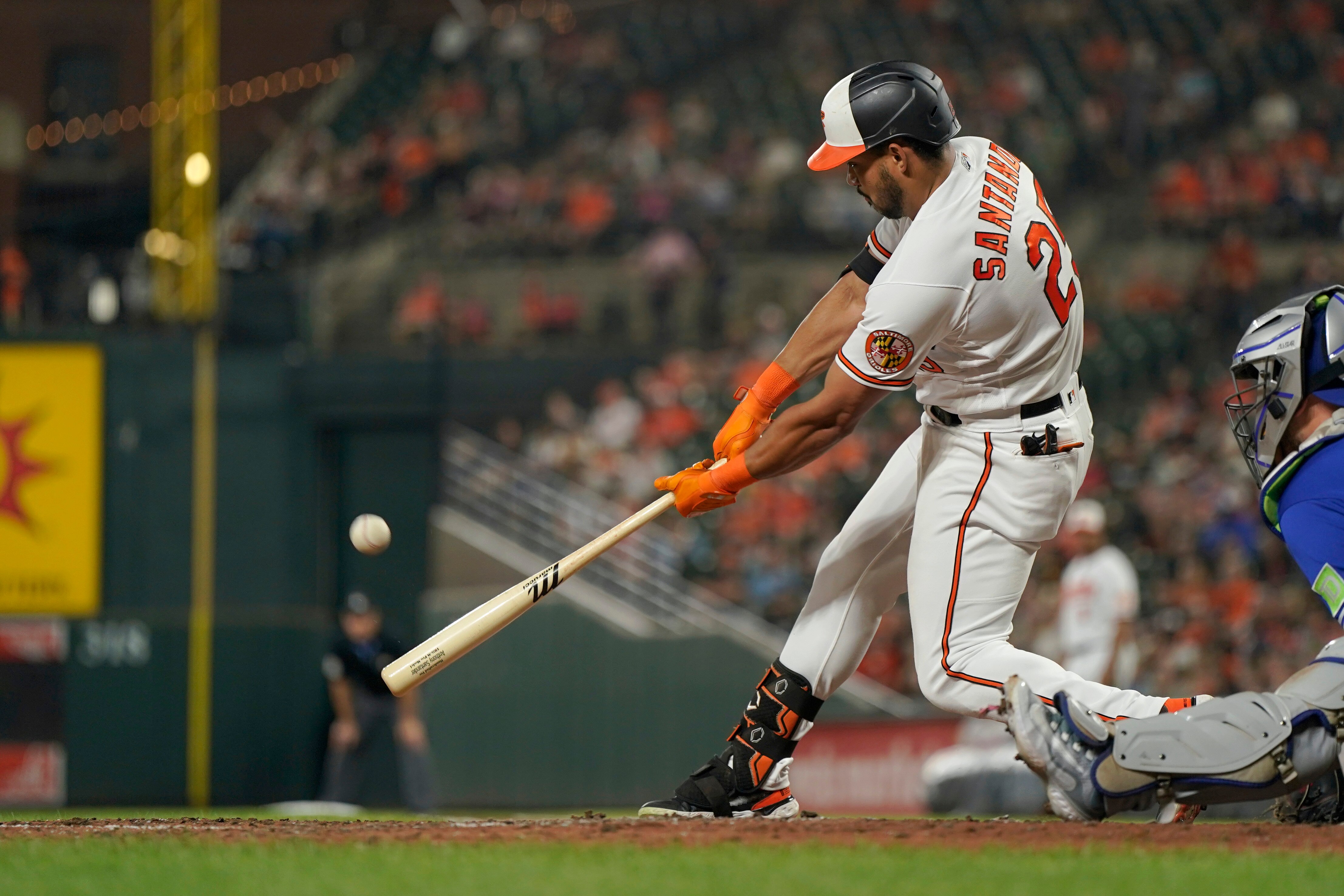 Anthony Santander hits the first of his two home runs in the fifth inning of the Orioles' 7-0 win over the Blue Jays Wednesday night.