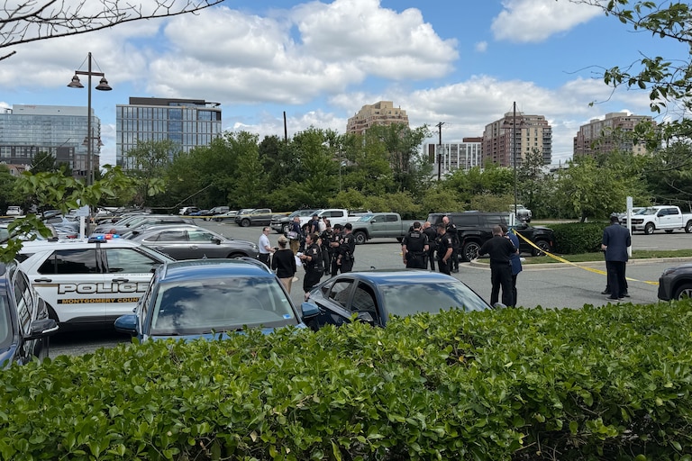 The scene of a fatal shooting at about 11:30 a.m. Thursday in a North Bethesda parking lot.