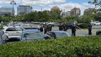 The scene of a fatal shooting at about 11:30 a.m. Thursday in a North Bethesda parking lot.