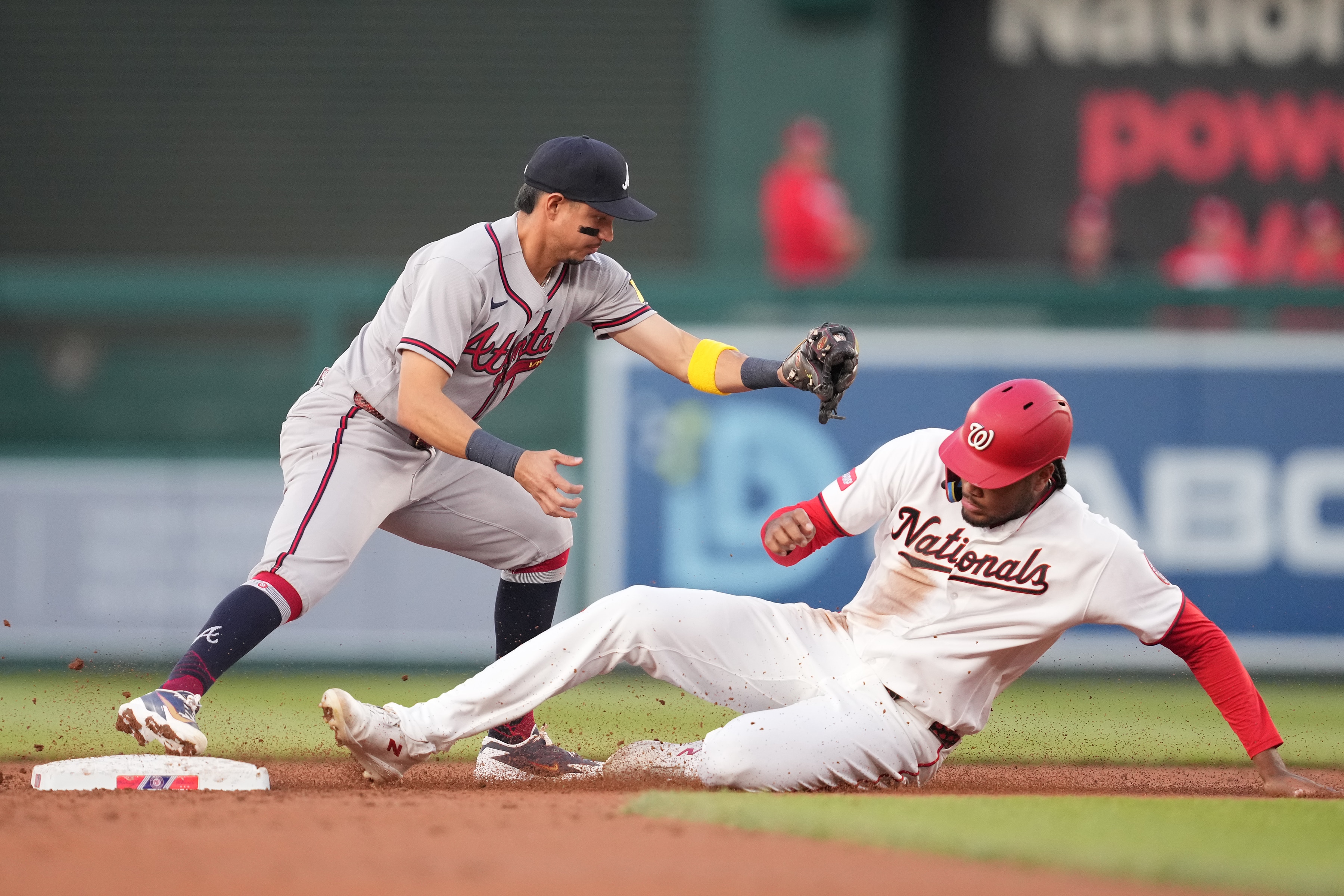 Mauricio Dubón of the Braves forces out James Wood of the Nationals at second base during the second inning Wednesday night.