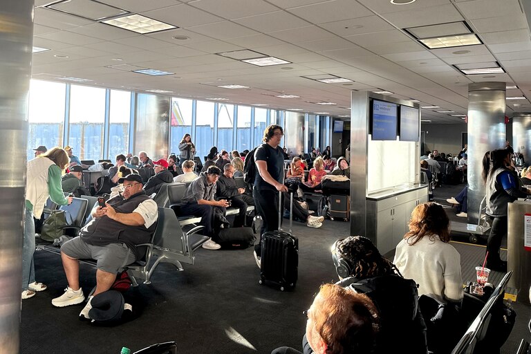 FRIDAY, MARCH 13, 2026 - Stranded travelers crowd the Southwest domestic terminal at Baltimore-Washington International Thurgood Marshall Airport on Friday after a ground stop due to a “strong chemical smell” at the region’s air traffic control facility, a Federal Aviation Administration spokesperson said in an email.