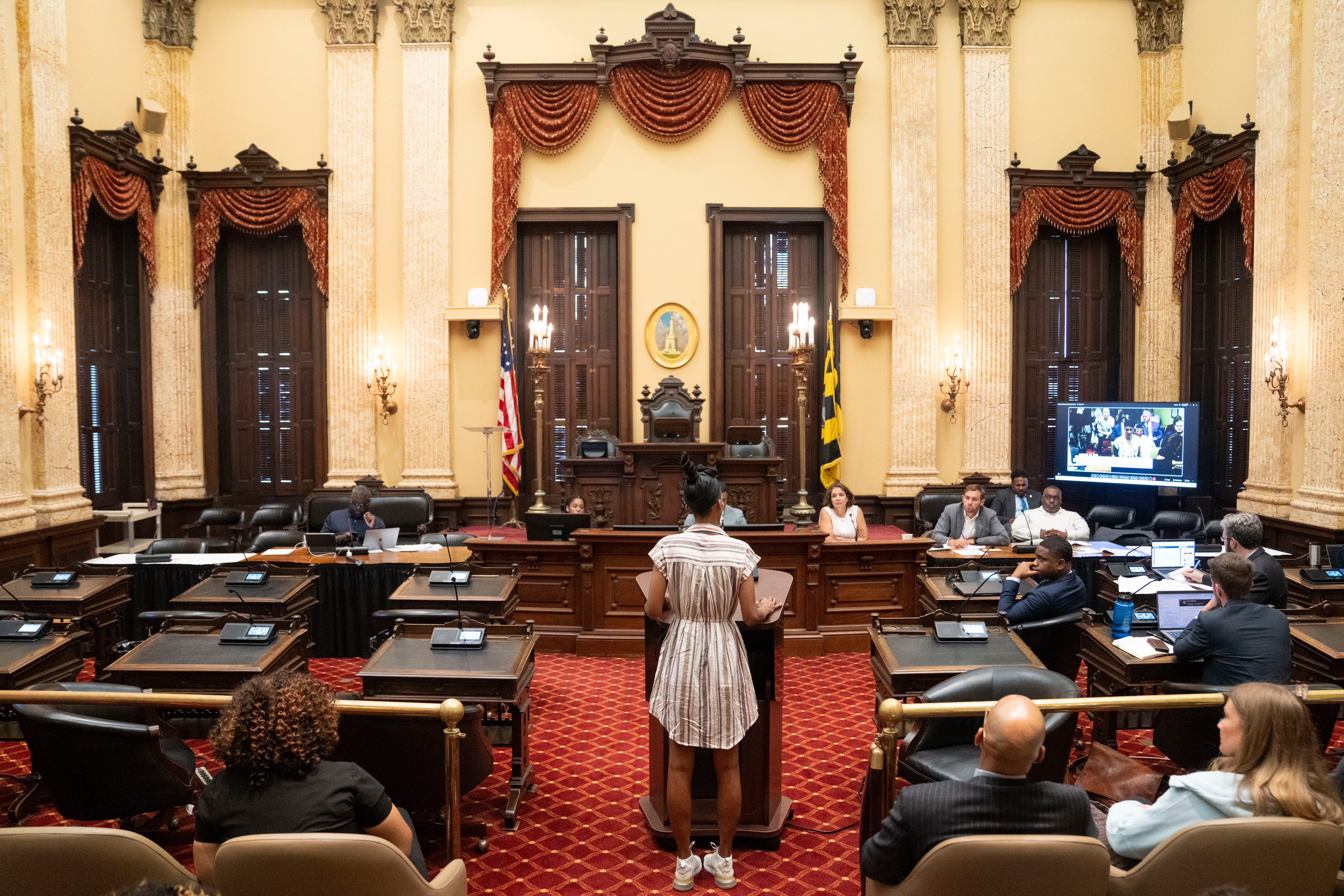 Ashley Simms speaks during a public hearing for eviction legislation in City Hall, in Baltimore, on Tuesday.