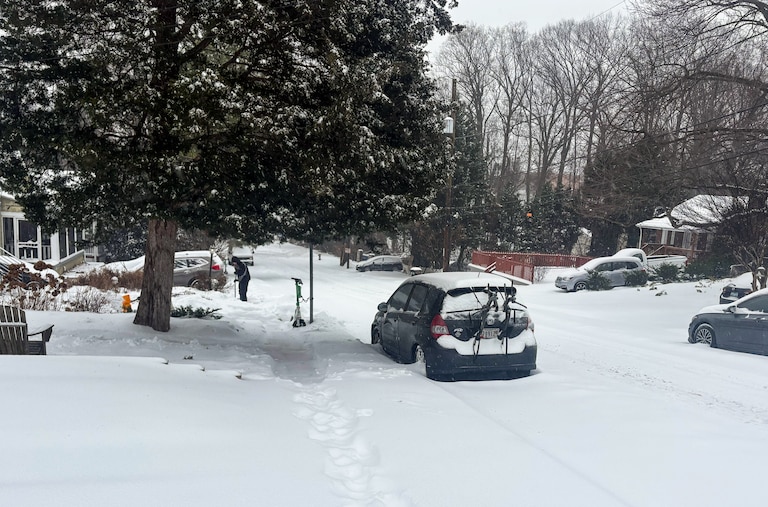 Snow piles up on Thayer Avenue, just south of downtown Silver Spring, on Sunday morning.