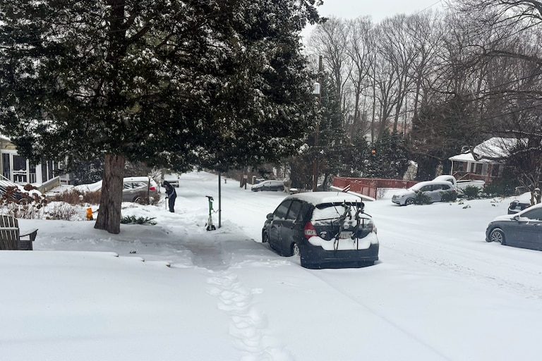 Snow piles up on Thayer Avenue, just south of downtown Silver Spring, on Sunday morning.