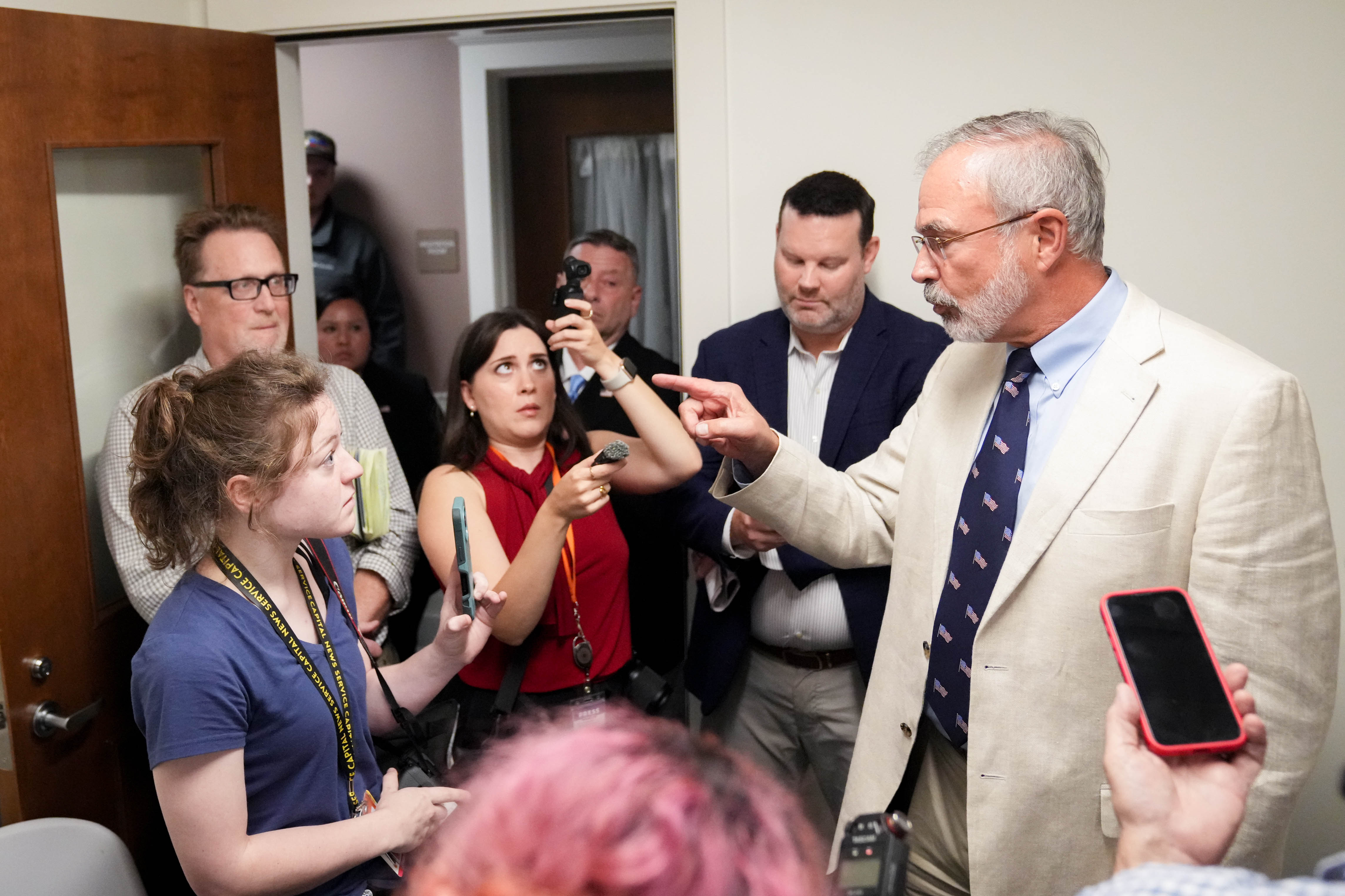 U.S. Rep. Andy Harris refuses to take questions from a reporter following a debate Tuesday in Cambridge.