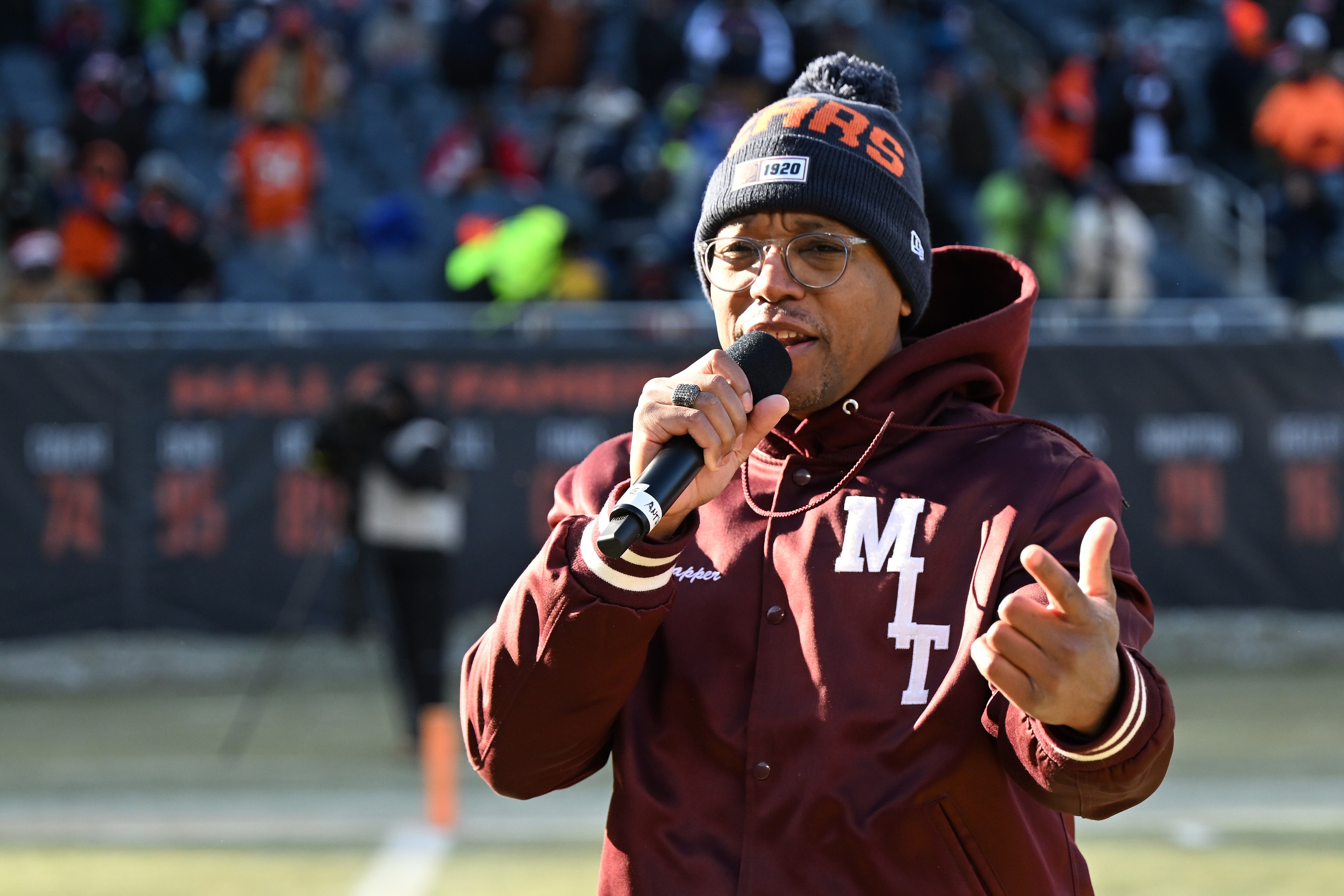 CHICAGO, ILLINOIS - DECEMBER 24: Lupe Fiasco performs at halftime in the game between the Buffalo Bills and the Chicago Bears at Soldier Field on December 24, 2022 in Chicago, Illinois.