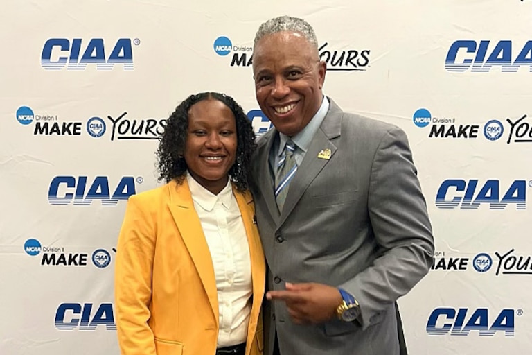 Clyde Doughty and Jolisaa Williams when Williams was named 2023-2024 John Holley Sports Information Director of the Year.