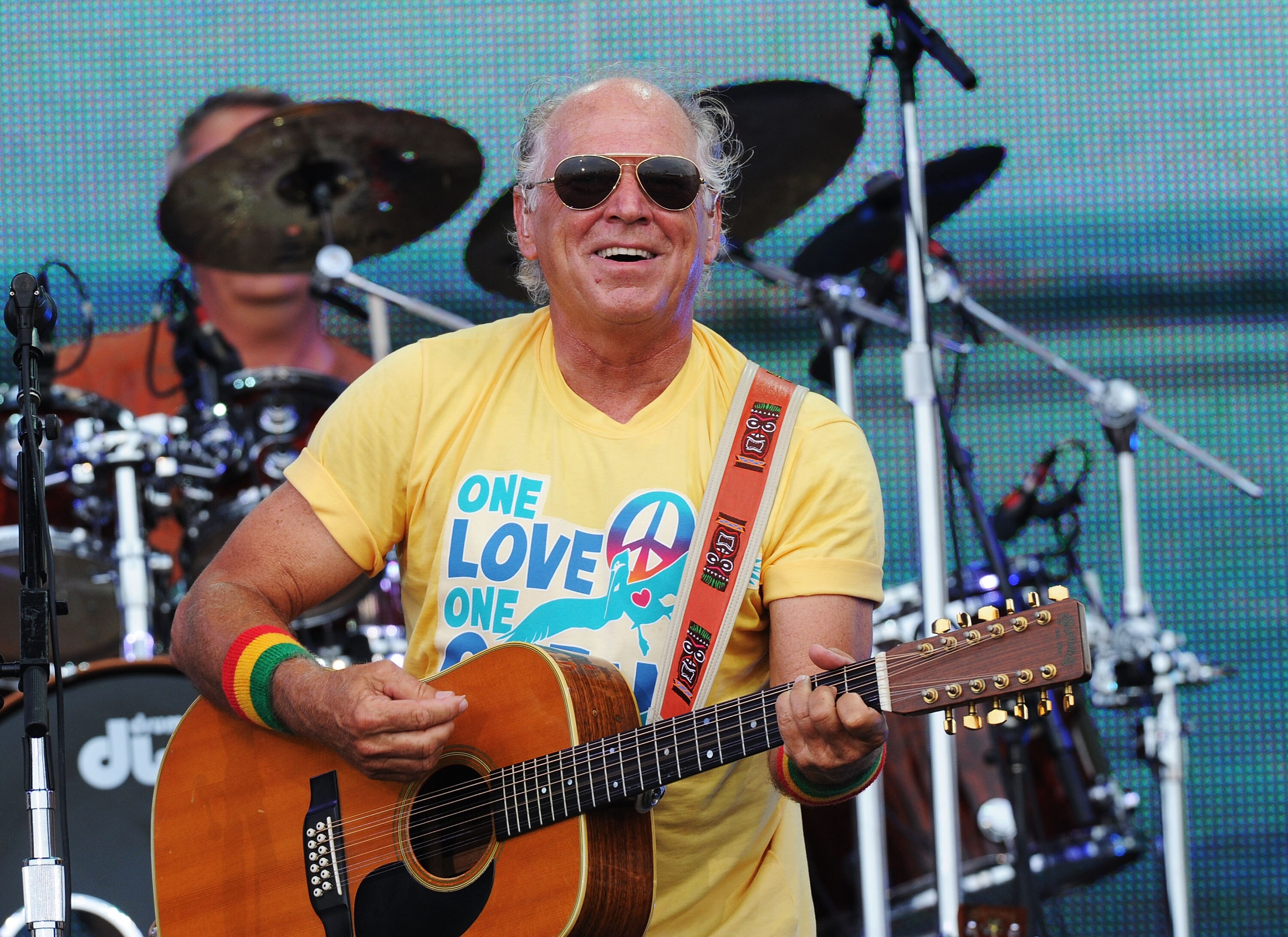 Jimmy Buffett performs onstage in Gulf Shores, Alabama, in July 2010.