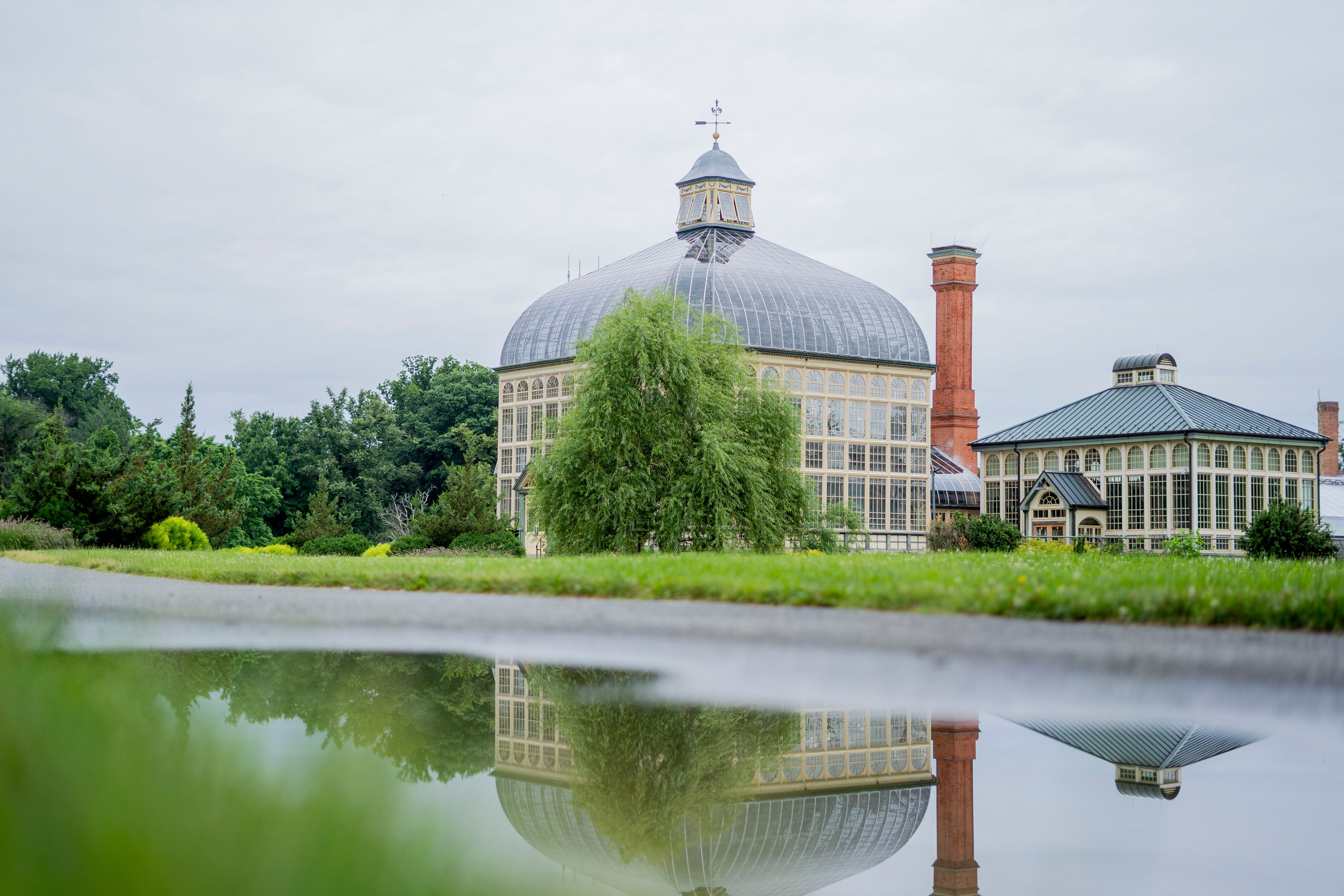 The exterior of the Rawlings Conservatory and Botanical Gardens in Druid Hill Park.