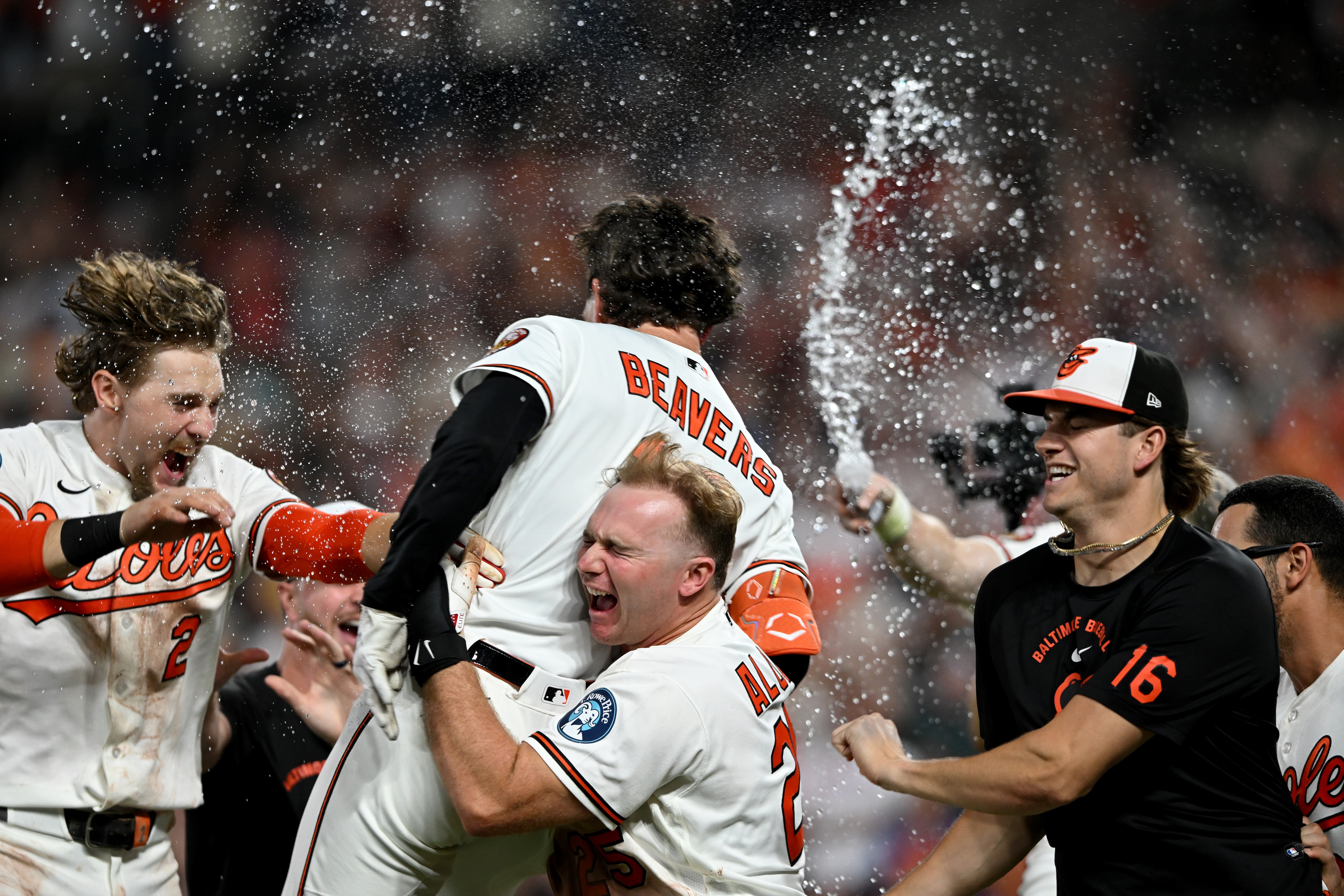 Teammates converge on Dylan Beavers after his walk-off hit to beat the Rays on Saturday night at Camden Yards.