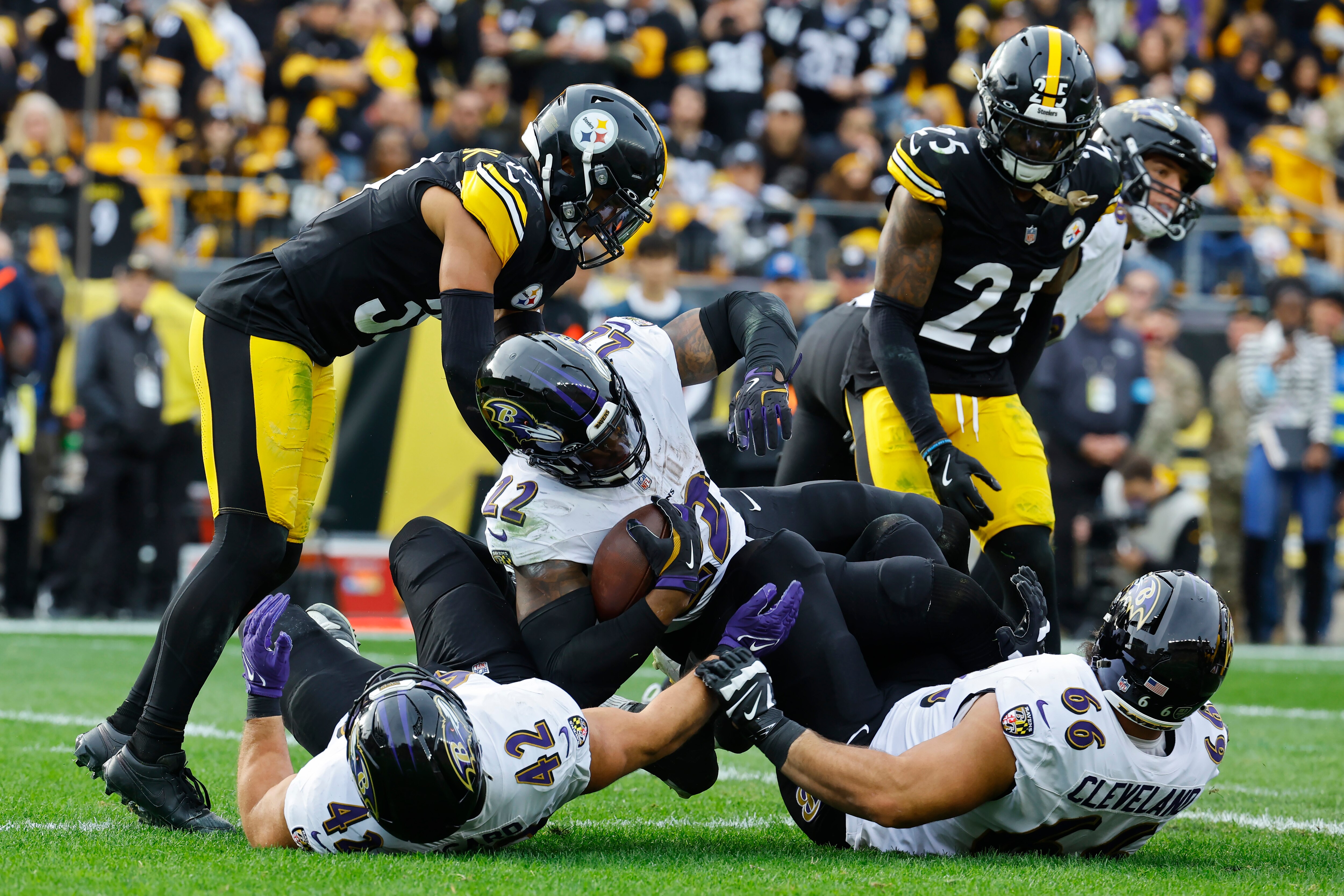 Ravens running back Derrick Henry scores a second-quarter touchdown against the Steelers on Sunday, his 15th TD of the season.