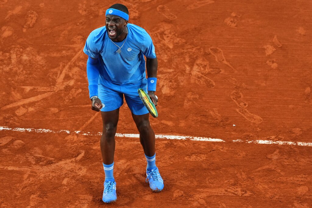 Frances Tiafoe of the U.S. celebrates beating Germany's Daniel Altmaier during their fourth round match of the French Tennis Open