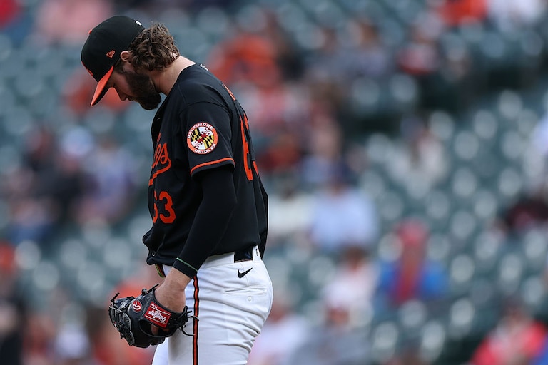 Orioles starting pitcher Brandon Young reacts after allowing a home run to Houston Astros designated hitter Yordan Alvarez during the second inning of game two.