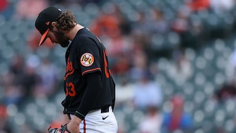 Orioles starting pitcher Brandon Young reacts after allowing a home run to Houston Astros designated hitter Yordan Alvarez during the second inning of game two.