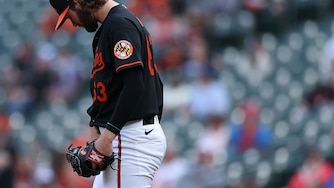Orioles starting pitcher Brandon Young reacts after allowing a home run to Houston Astros designated hitter Yordan Alvarez during the second inning of game two.