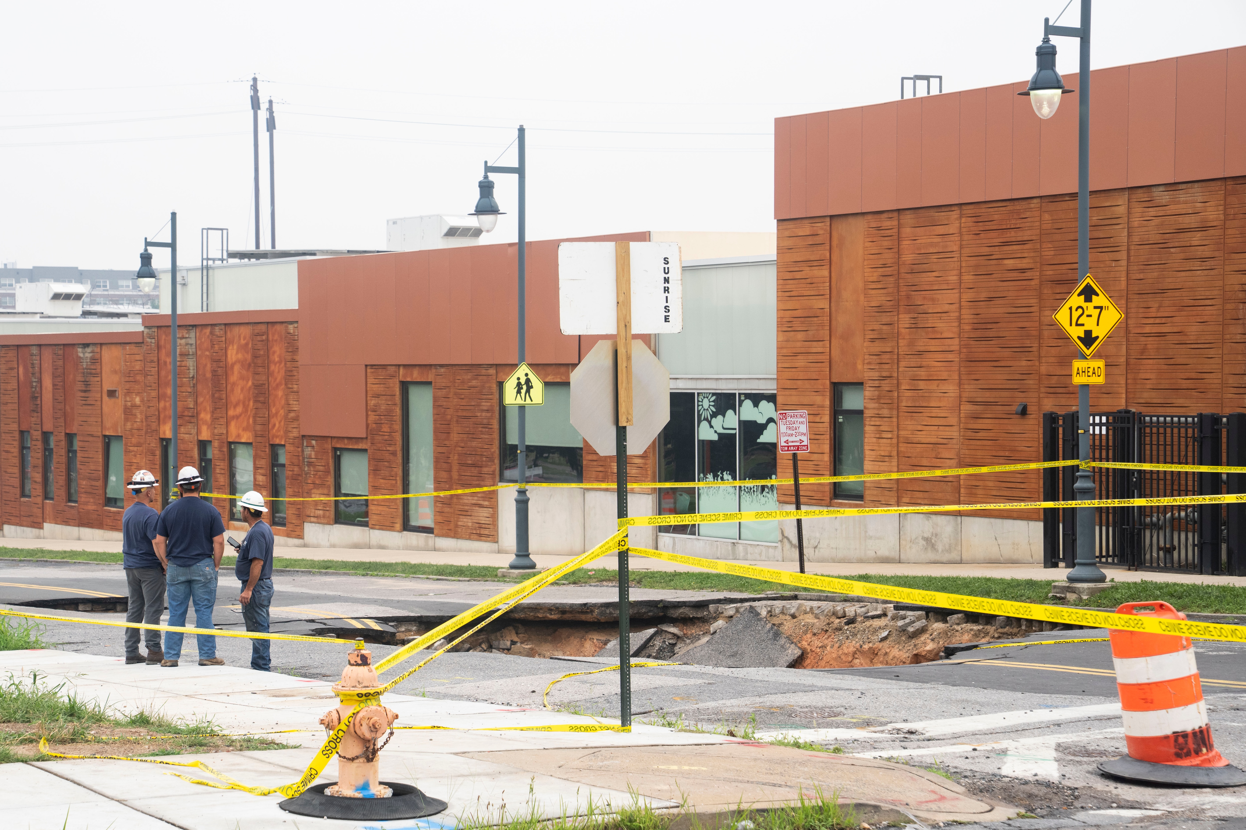 A sinkhole opened around 12:21 a.m. Saturday at North Chester Street and Ashland Avenue.