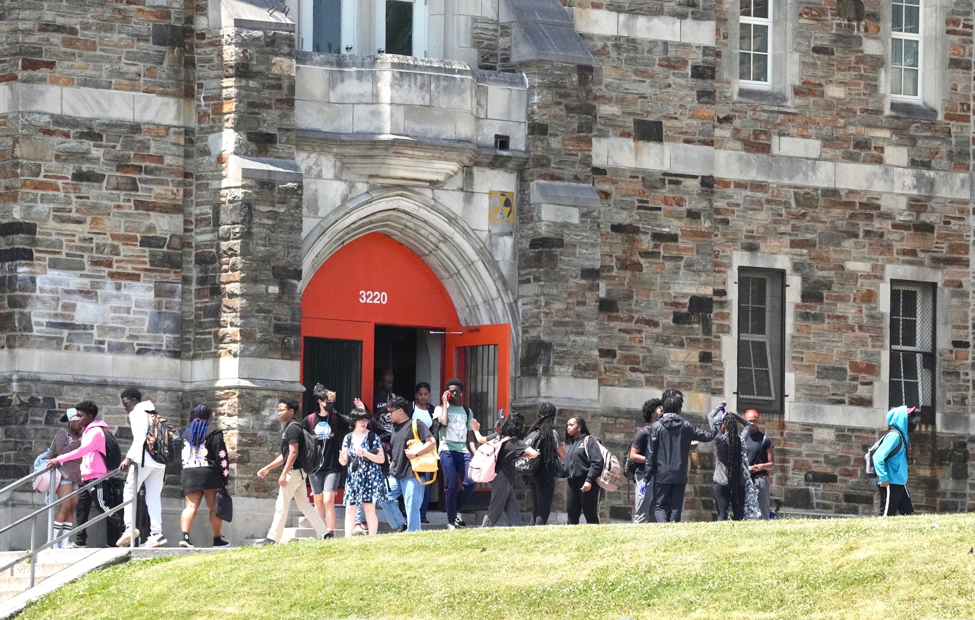 Students are dismissed early from school at Baltimore City College on June 2, 2023 because of lack of AC and rising temperatures inside the school building.