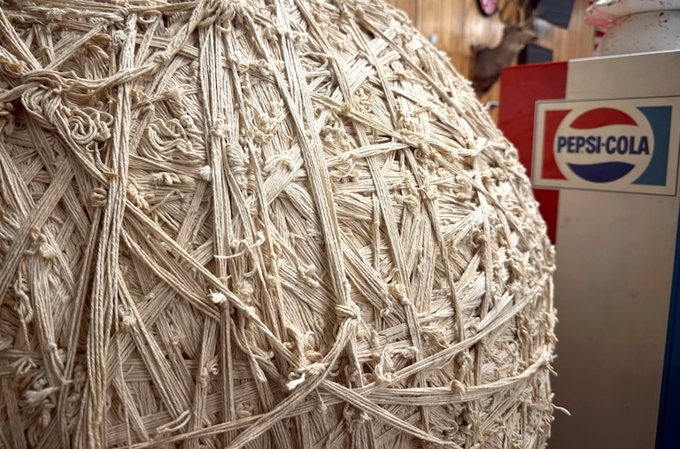 The ball of string was made by staff at Haussner’s restaurant, which closed in 1999. The ball heads to auction Nov. 22.